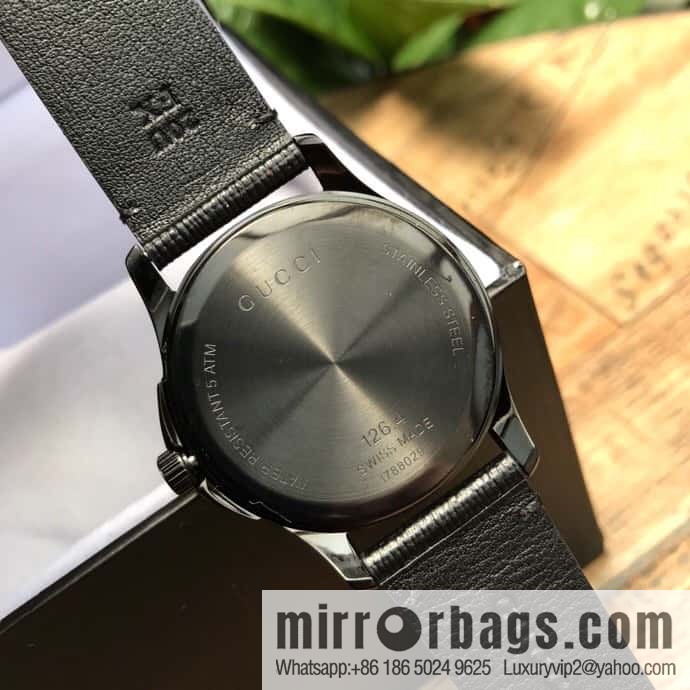 Gucci's latest black rubber strap with three-dimensional Gucci logo and black PVD pin clasp, Rhonda Quartz movement watch
