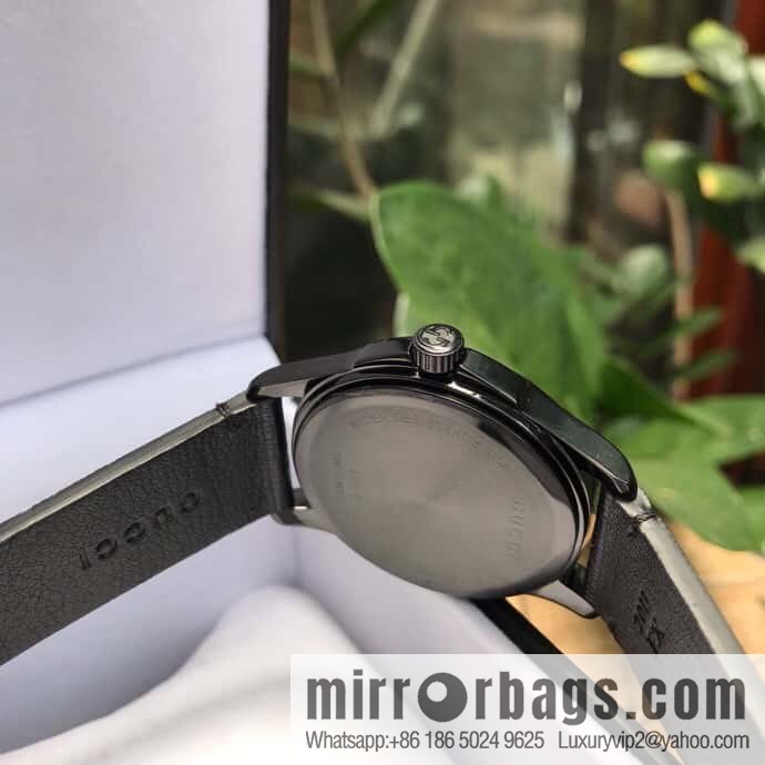 Gucci's latest black rubber strap with three-dimensional Gucci logo and black PVD pin clasp, Rhonda Quartz movement watch