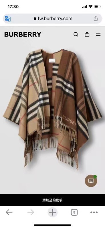 Burberry, the latest contrasting plaid jacquard cape
