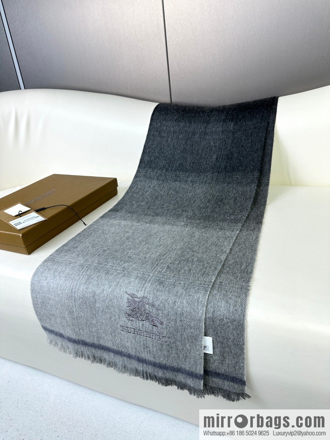 Burberry, counter-synced men's and women's cashmere scarves