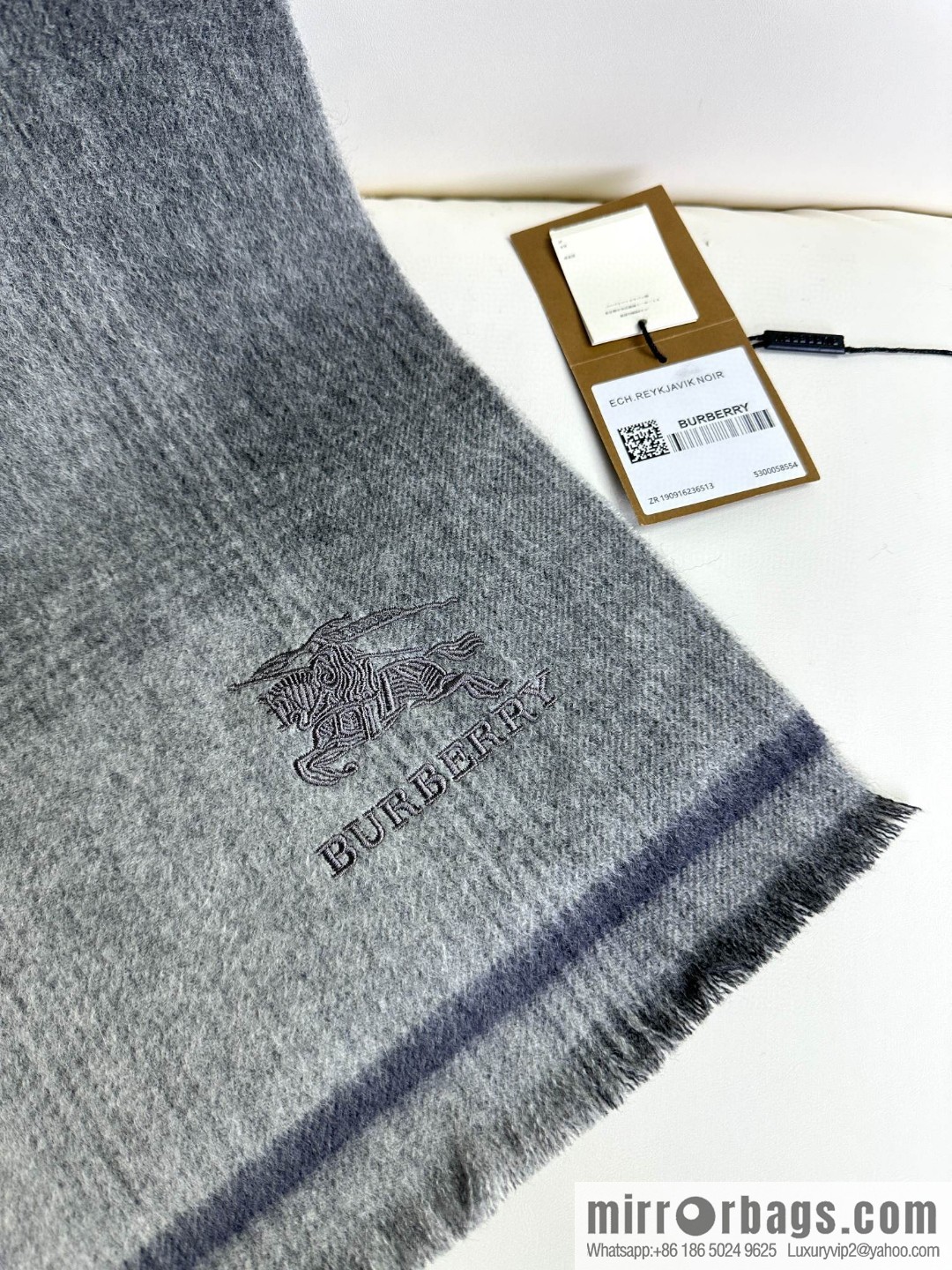 Burberry, counter-synced men's and women's cashmere scarves