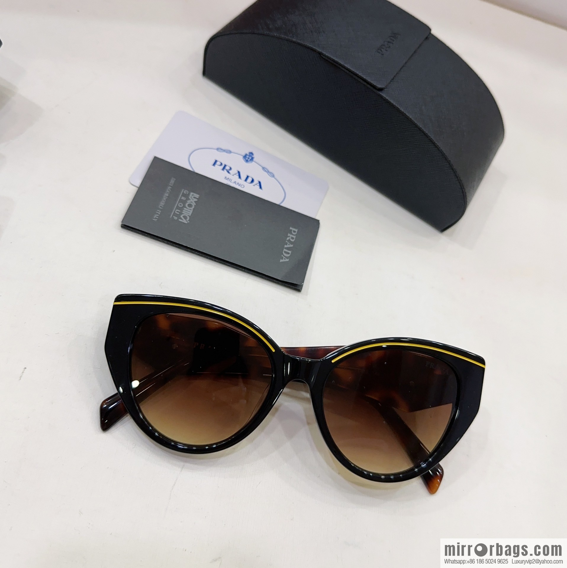 Prada round frame women's sunglasses
