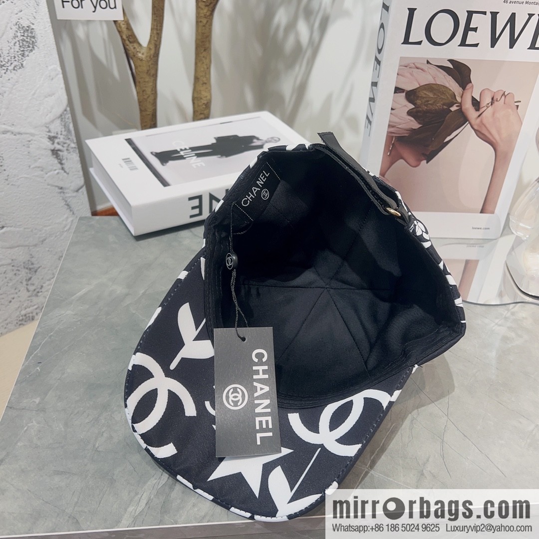 Chanel color-matching black and white flower cap