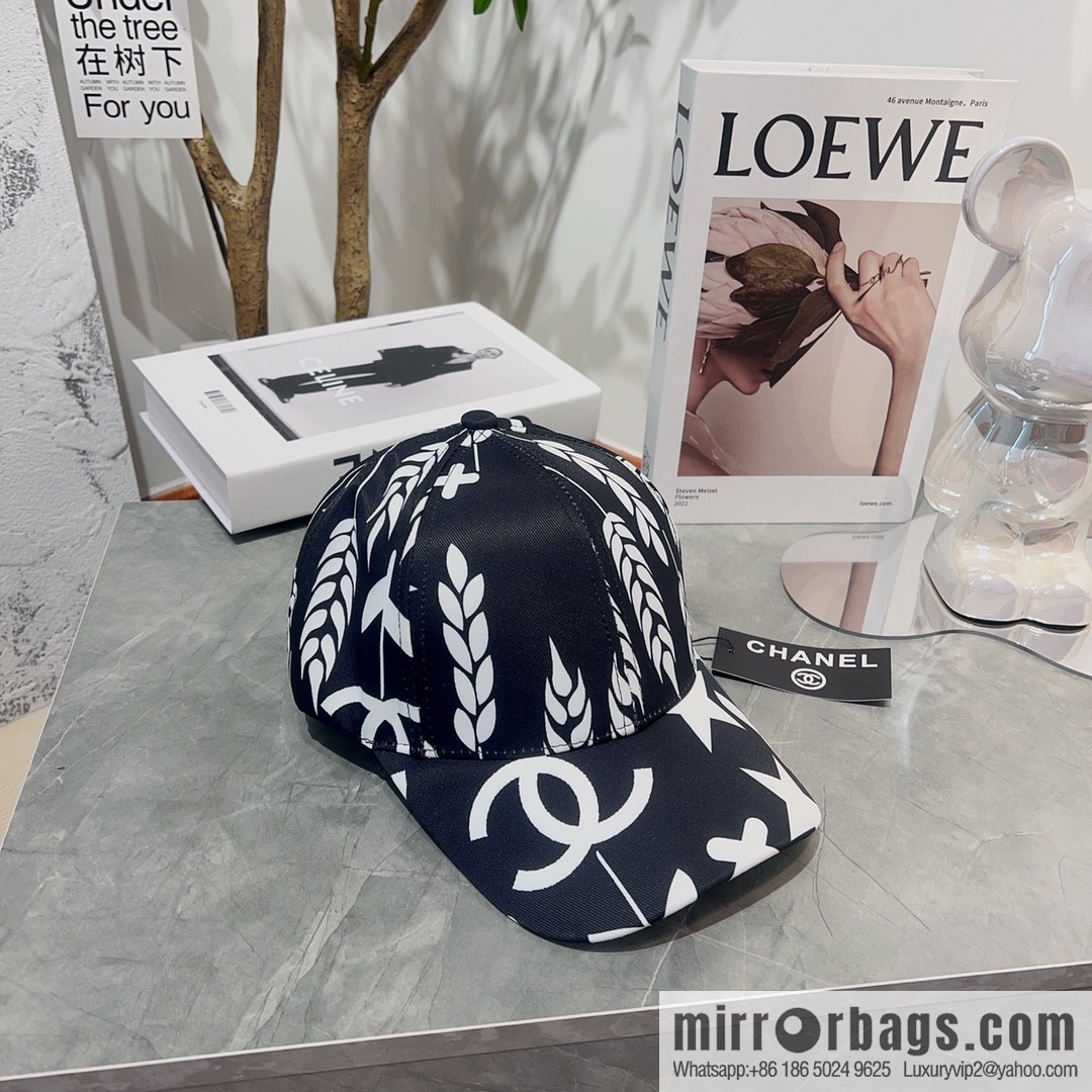 Chanel color-matching black and white flower cap