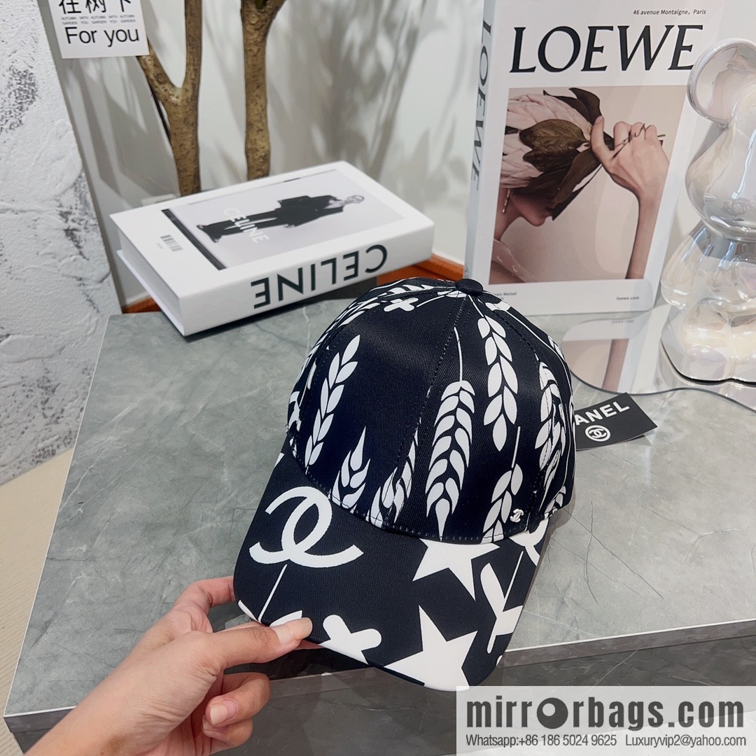 Chanel color-matching black and white flower cap