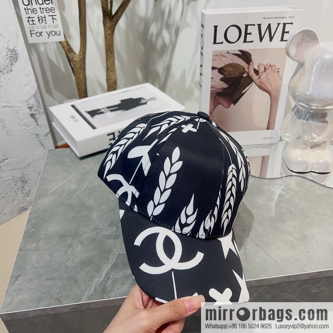 Chanel color-matching black and white flower cap
