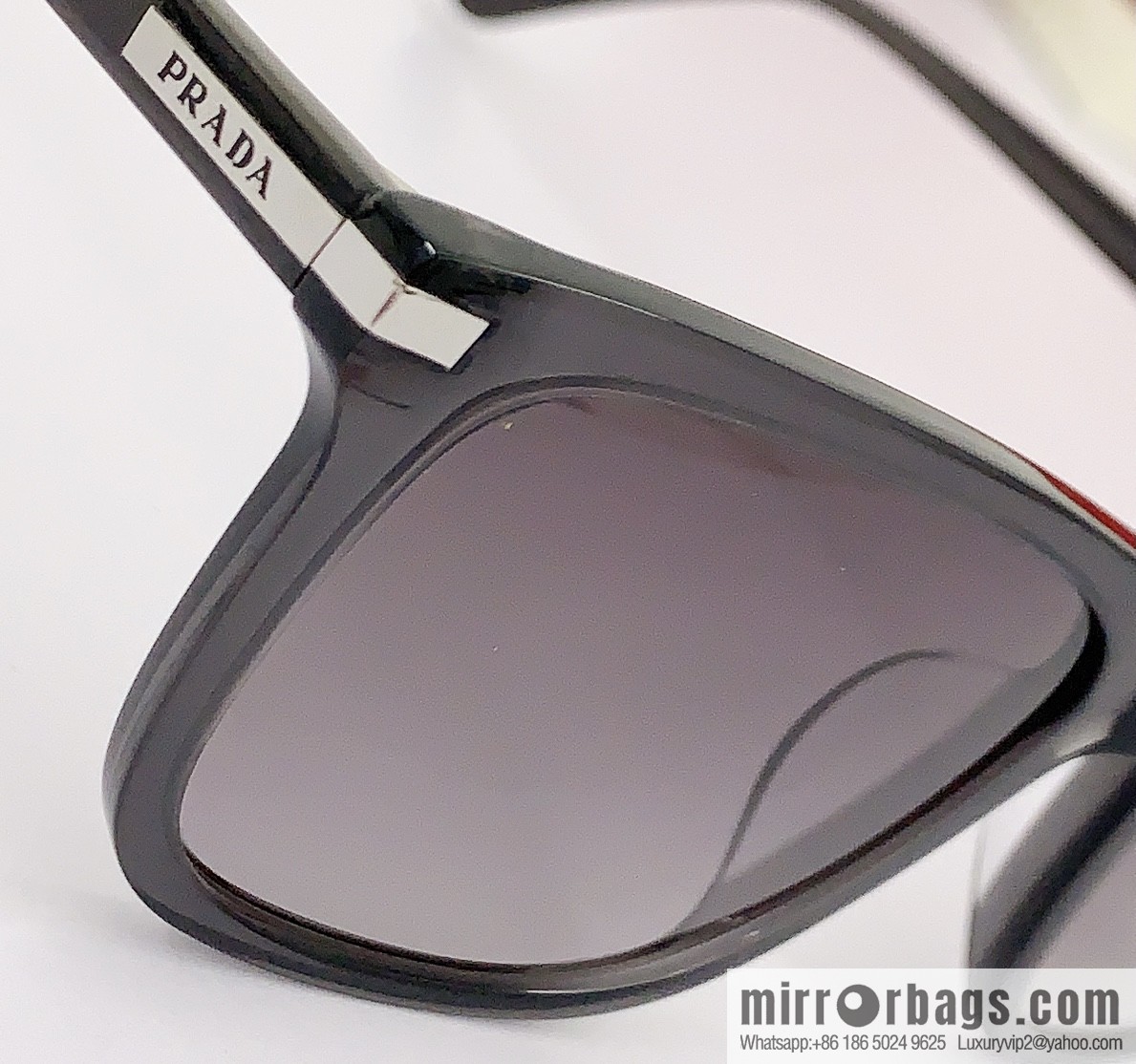 PRADA temple metal logo unisex sunglasses