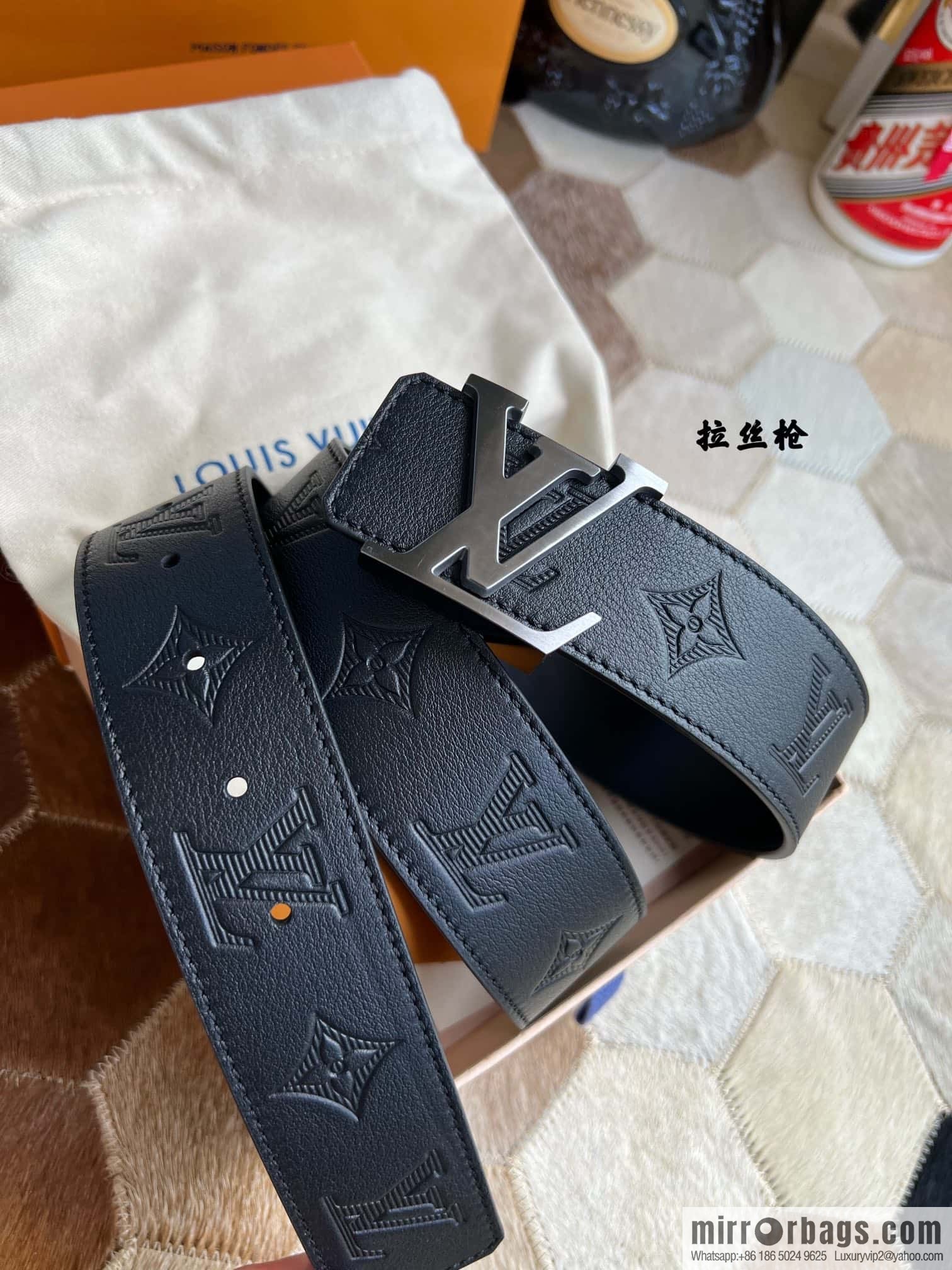 LV/Louis Vuitton, letter metal buckle cowhide embossed belt 40mm.