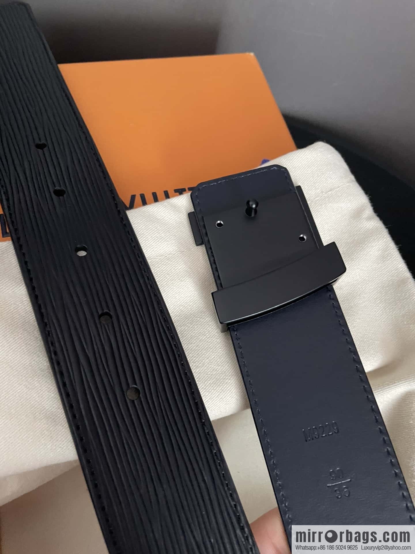 LV Initiales. 40mm Black Water Ripple Belt M9229