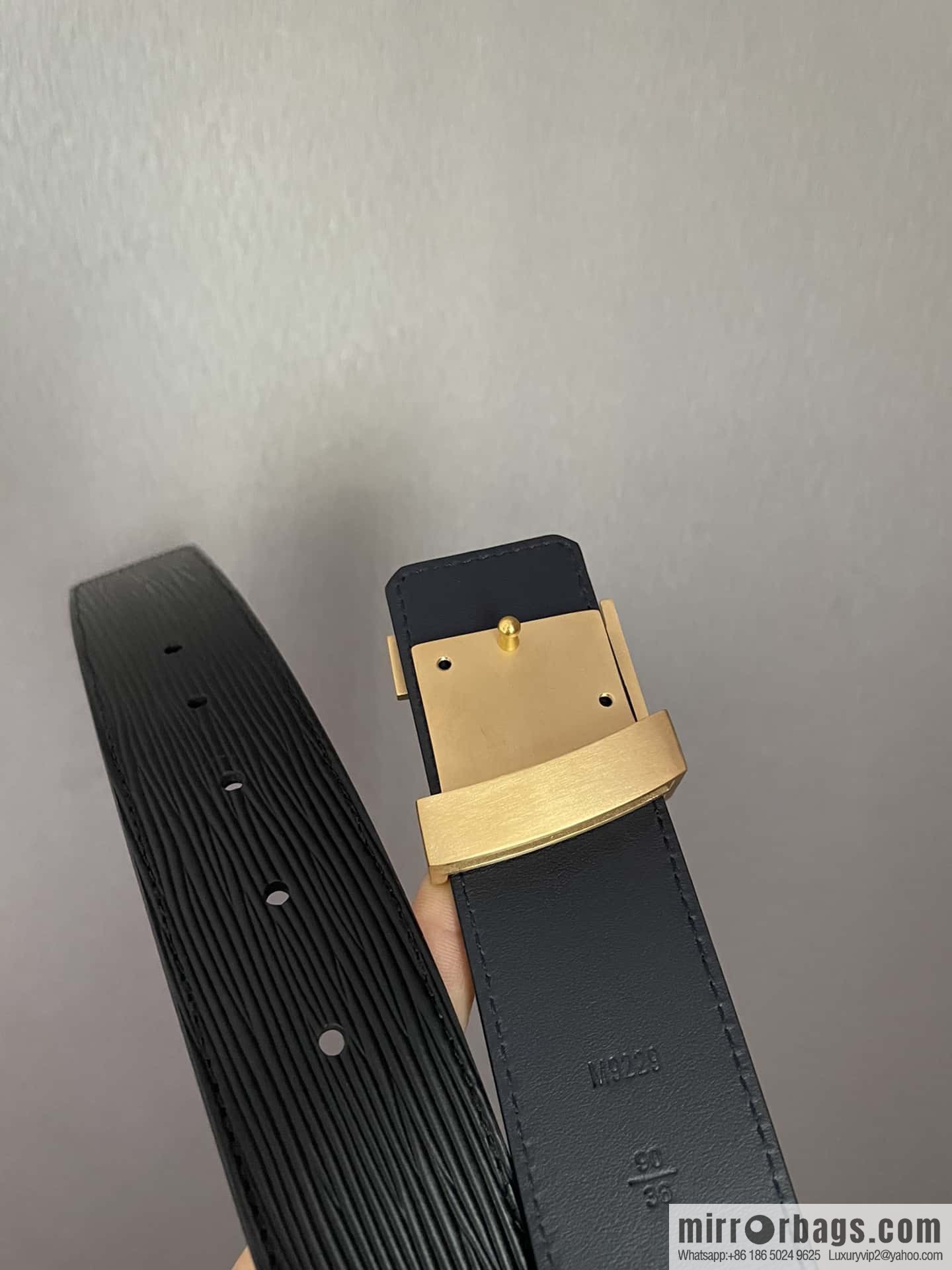 LV Initiales. 40mm Black Water Ripple Belt M9229