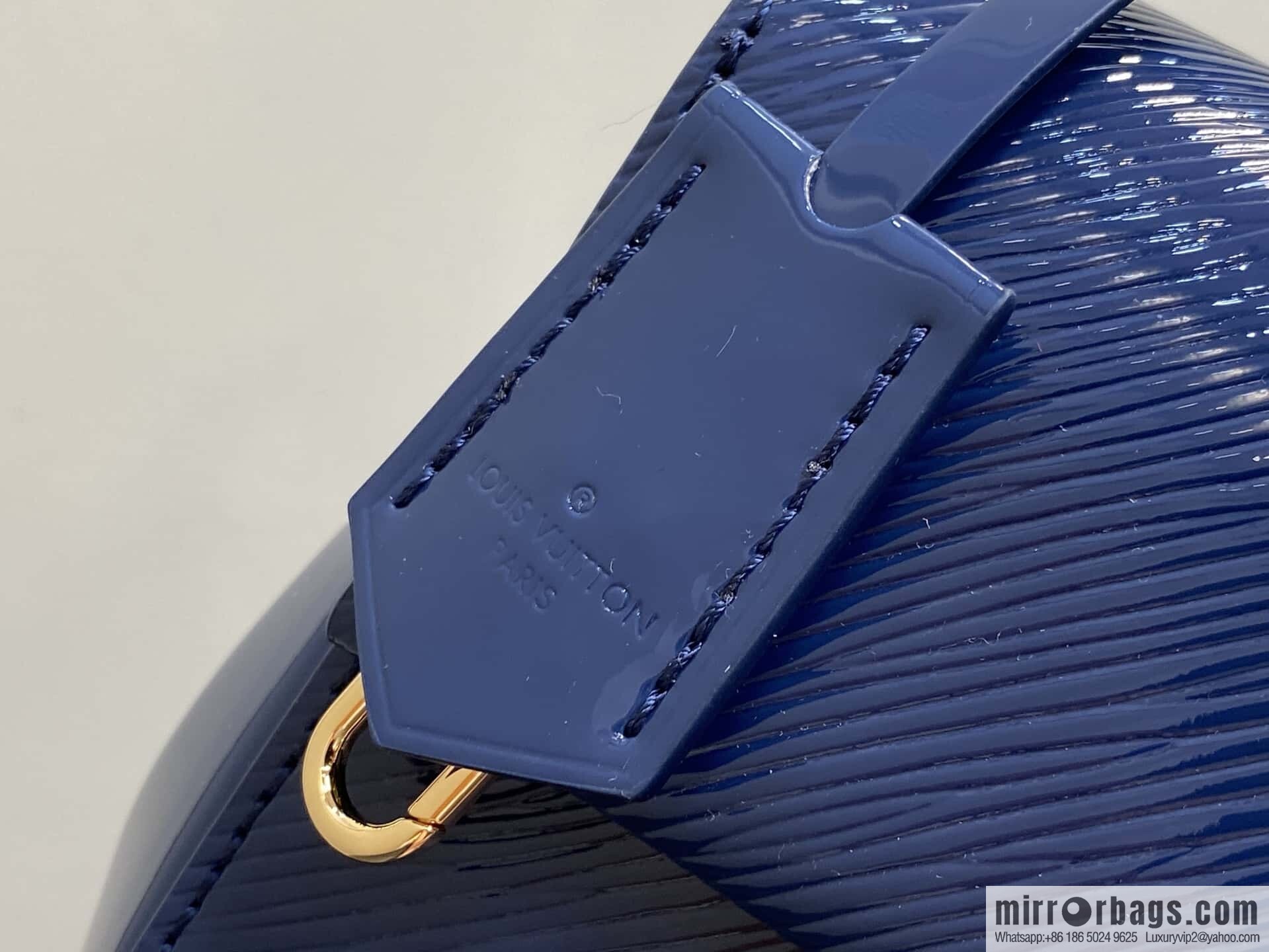 [Boutique‑grade] M58925 blue patent leather, water ripple handbag series CLUNY mini handbag