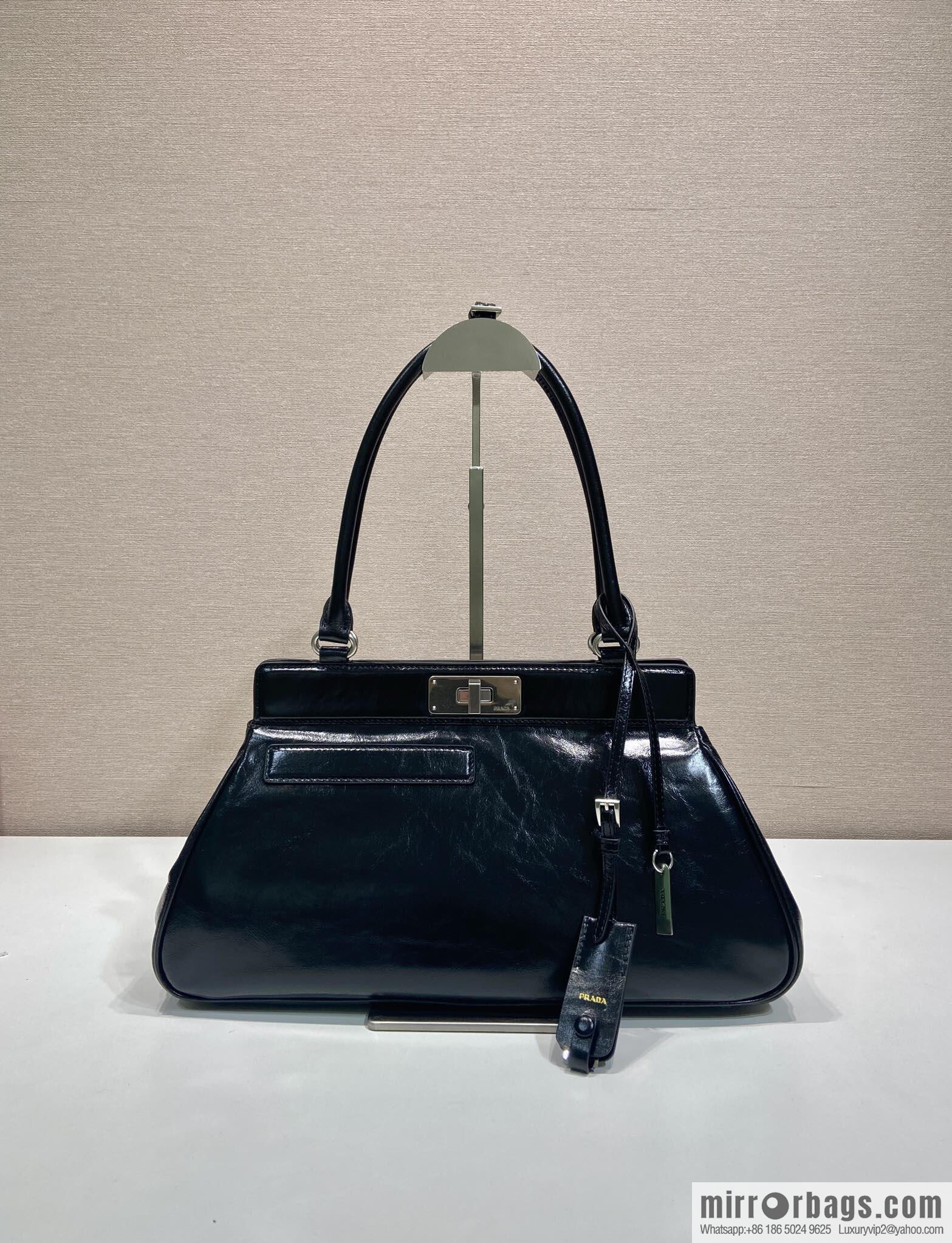 PRADA's new 1BG569 oil wax leather, black.