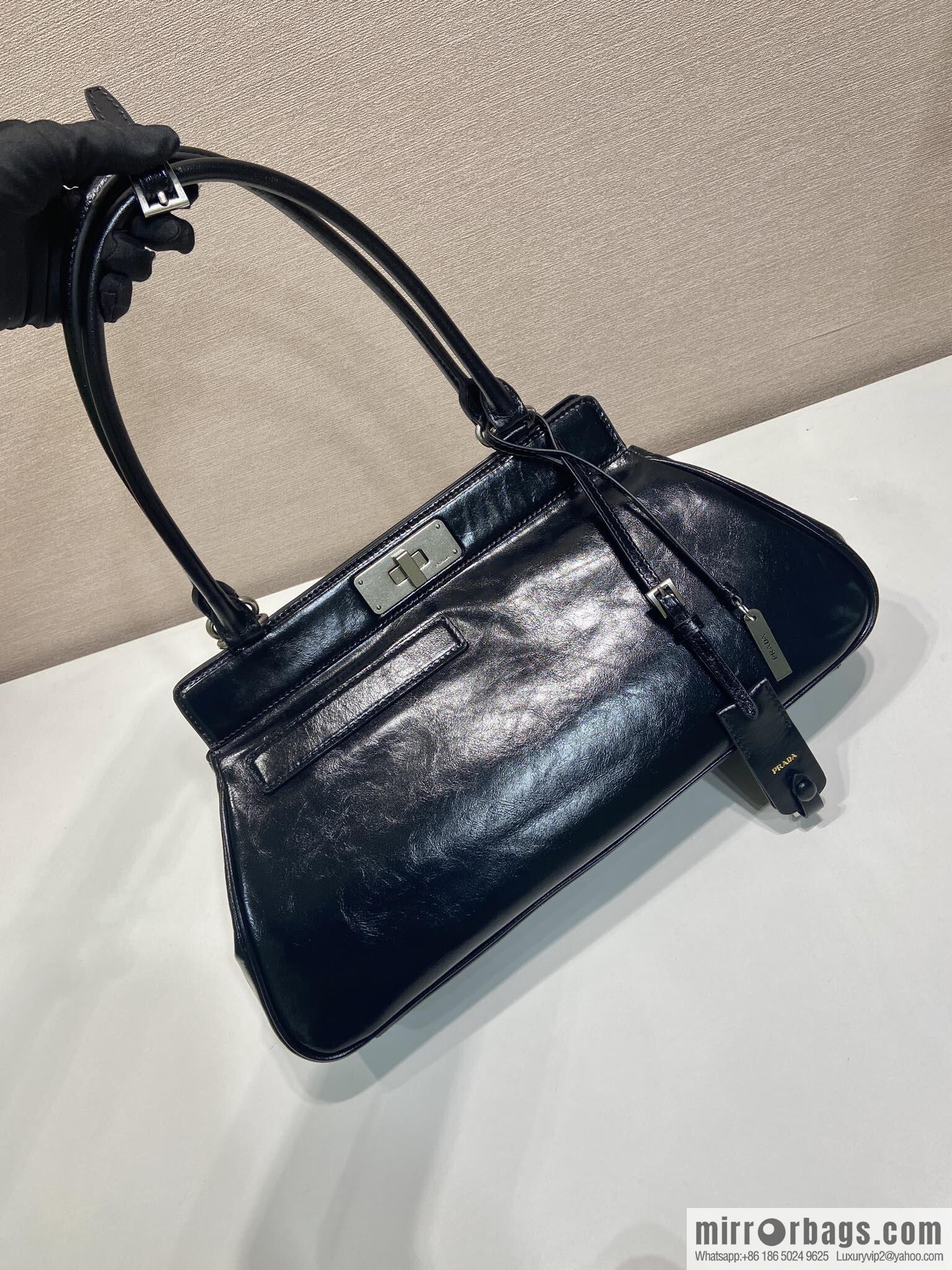PRADA's new 1BG569 oil wax leather, black.