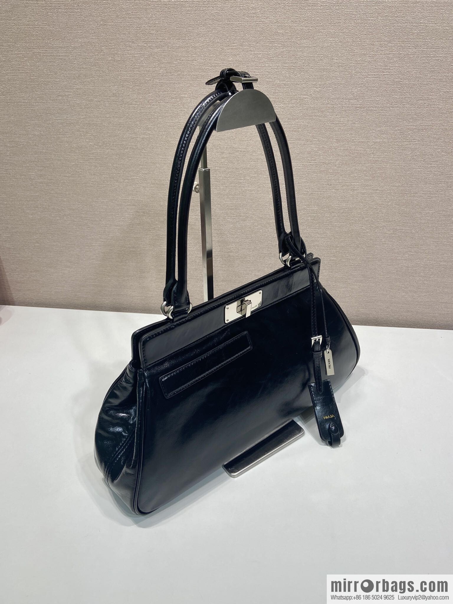 PRADA's new 1BG569 oil wax leather, black.