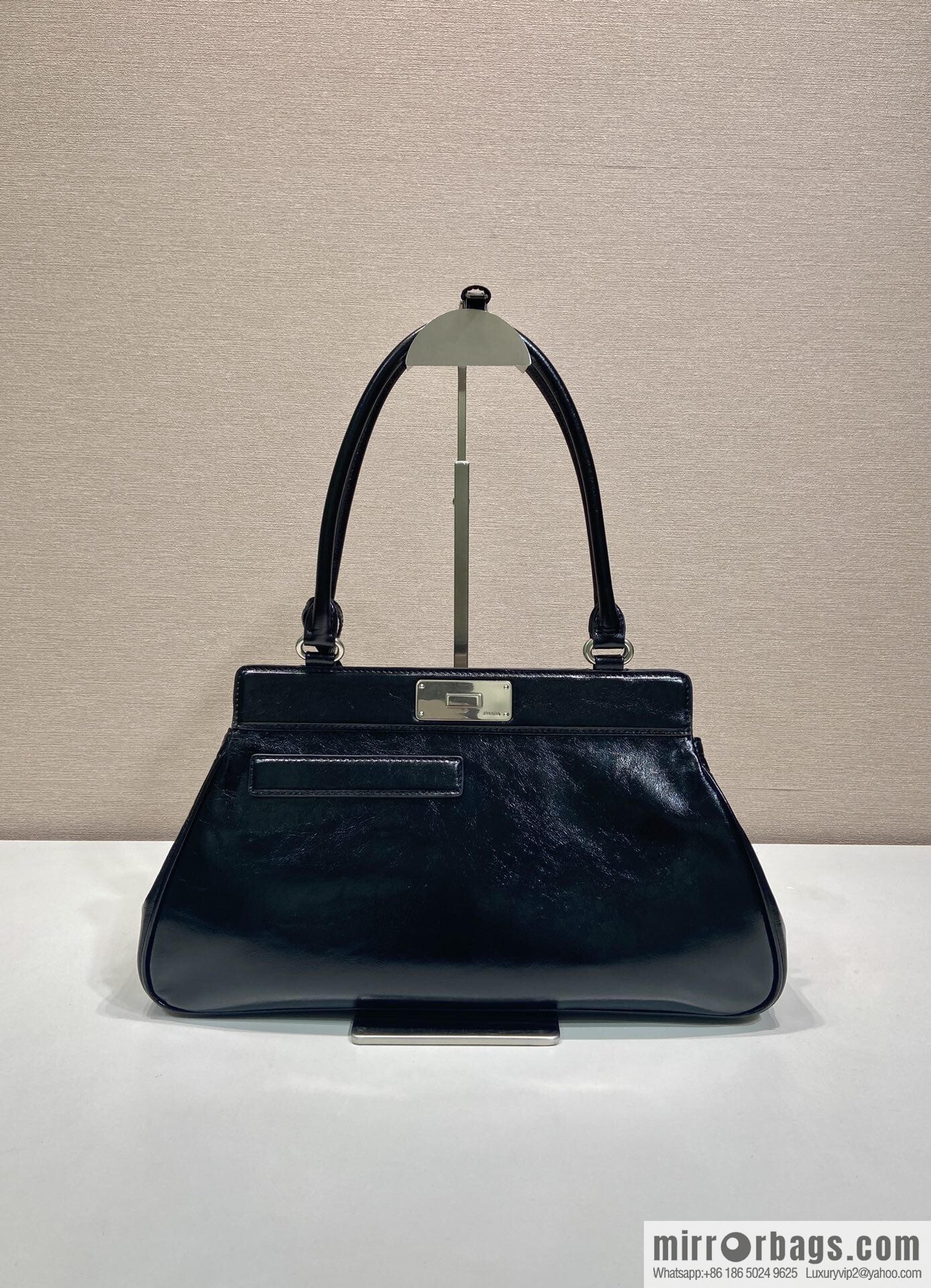 PRADA's new 1BG569 oil wax leather, black.