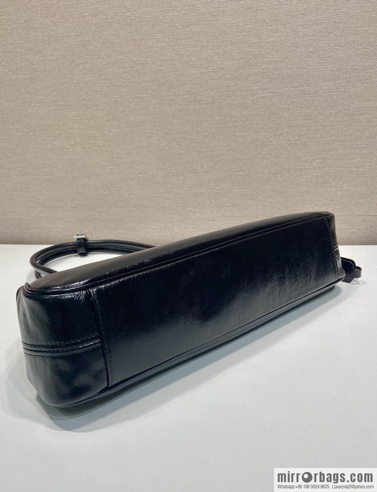 PRADA's new 1BG569 oil wax leather, black.