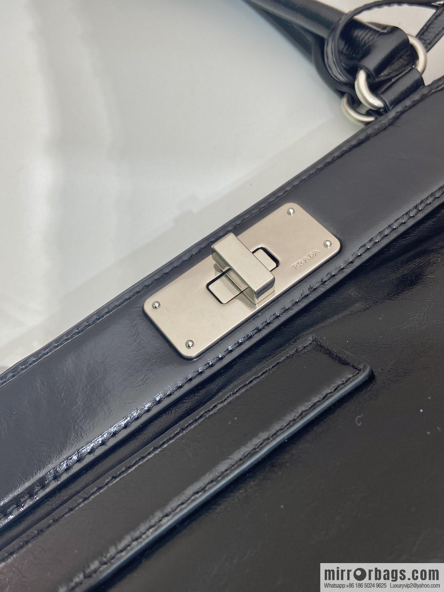 PRADA's new 1BG569 oil wax leather, black.