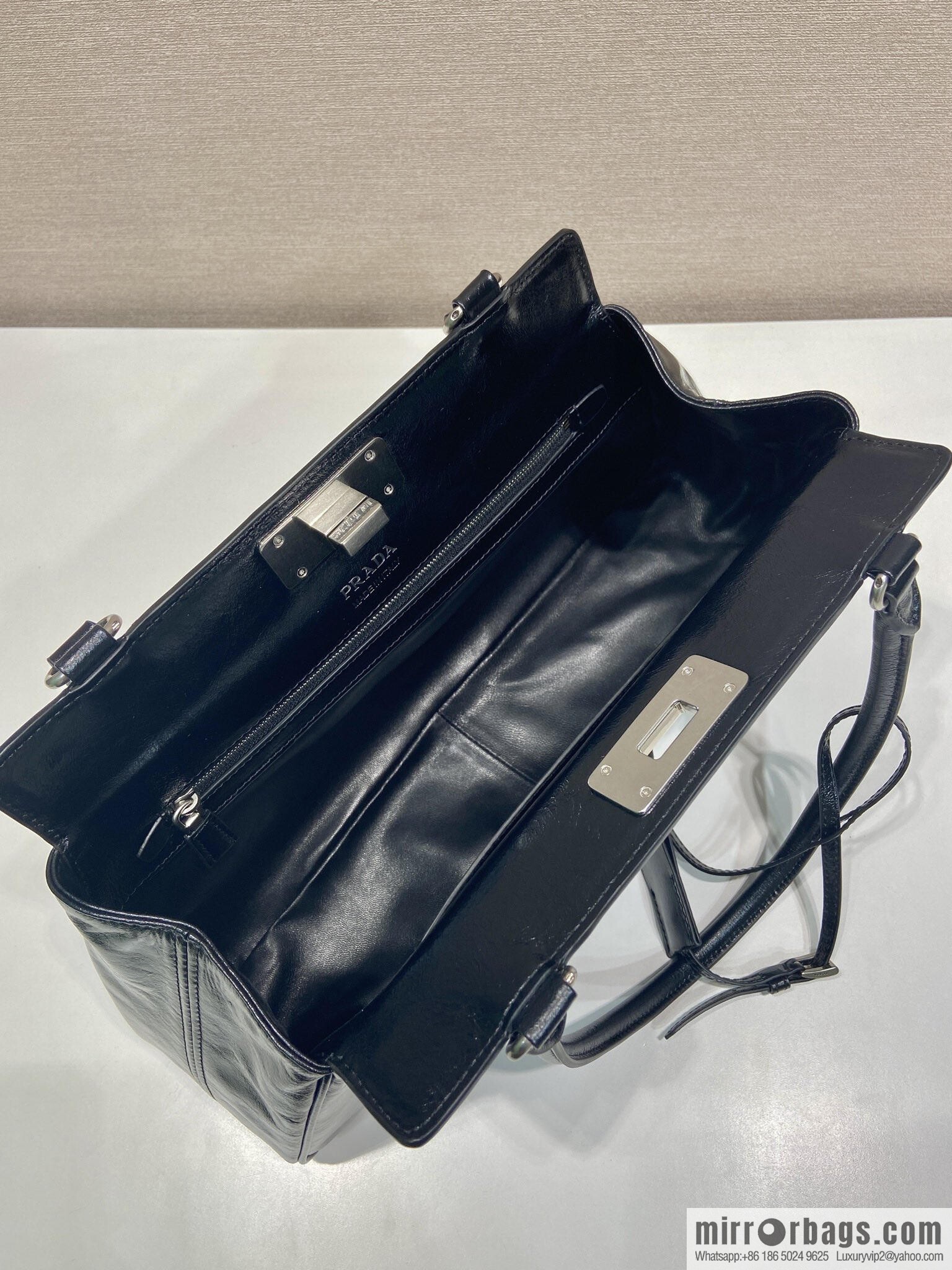 PRADA's new 1BG569 oil wax leather, black.