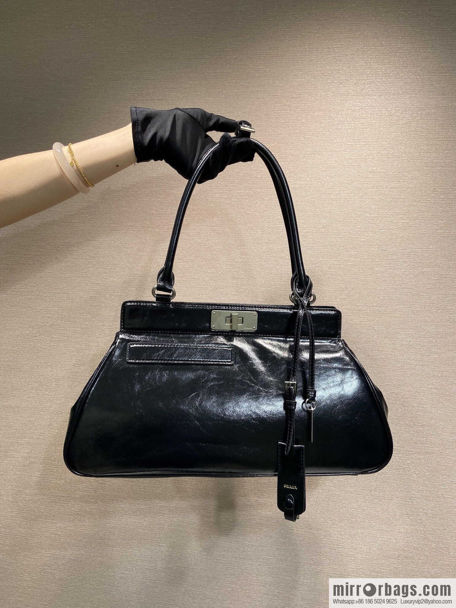 PRADA's new 1BG569 oil wax leather, black.