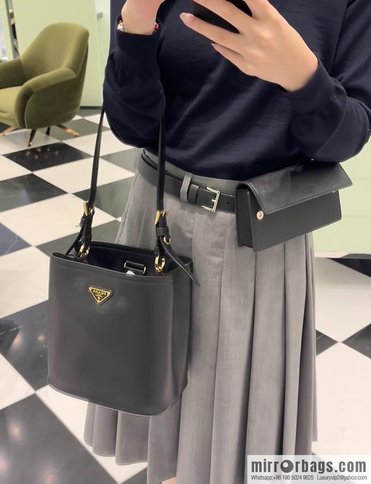 PRADA's new 1BE080 bucket bag, black.