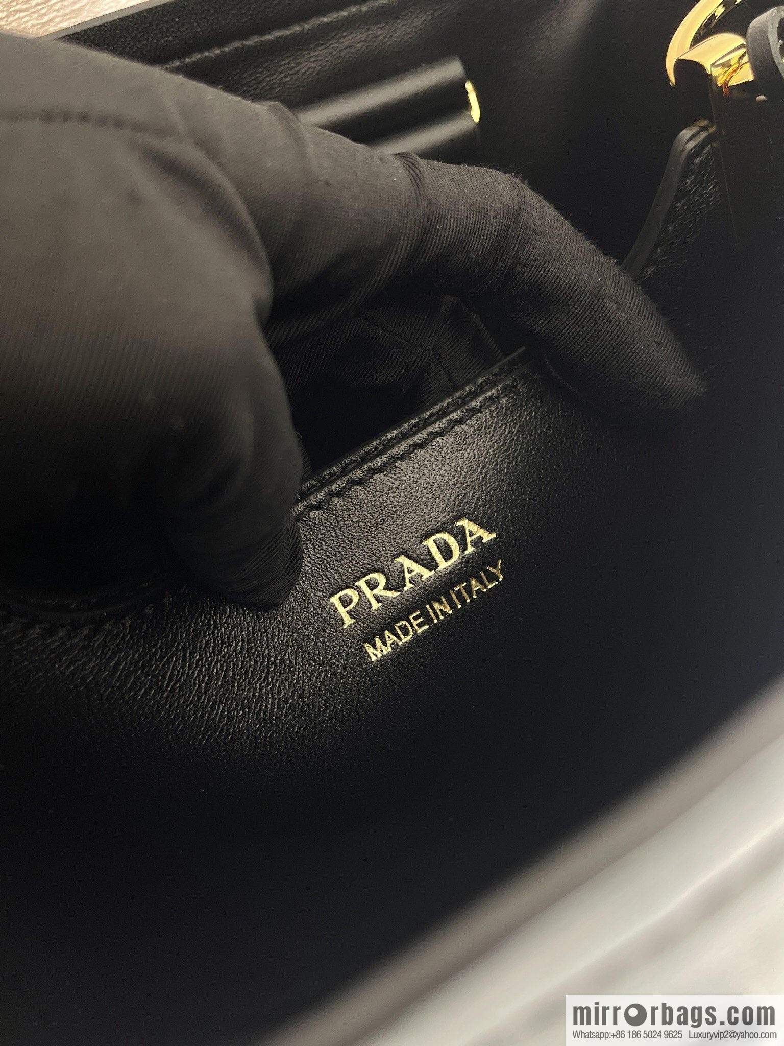 PRADA's new 1BE080 bucket bag, black.