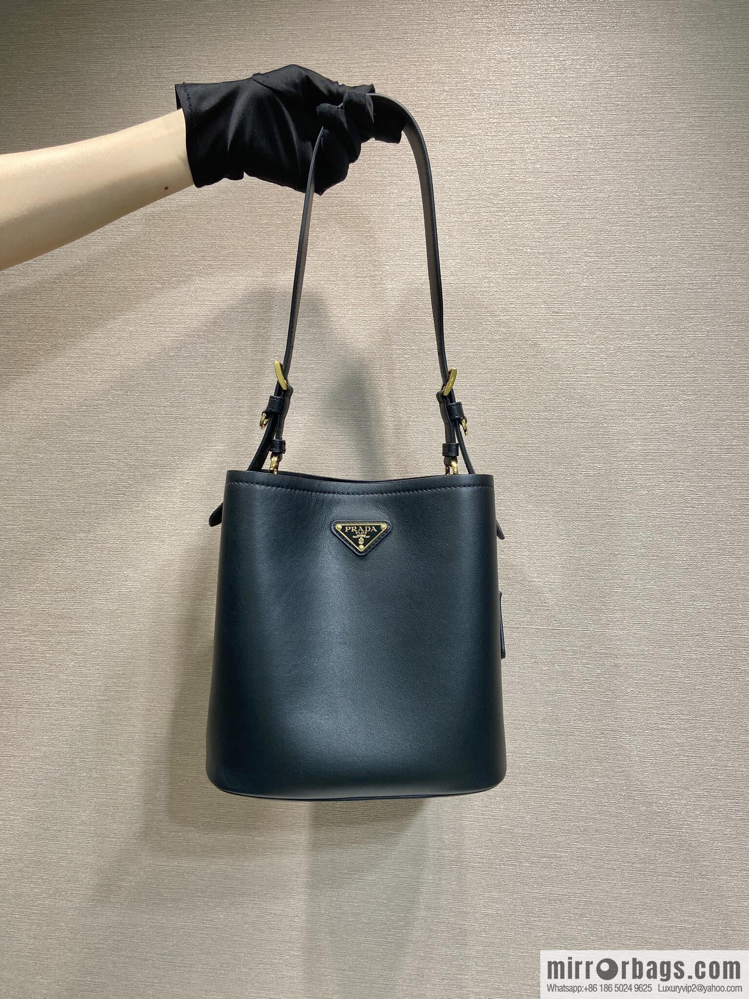PRADA's new 1BE080 bucket bag, black.