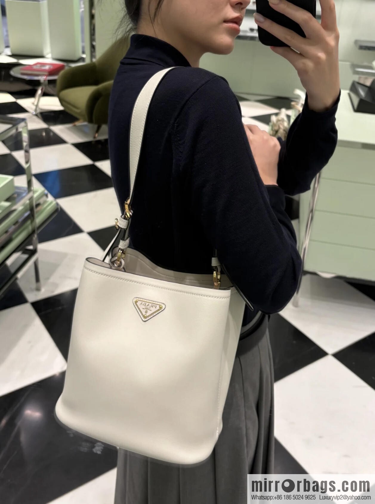 PRADA's new 1BE080 bucket bag, white