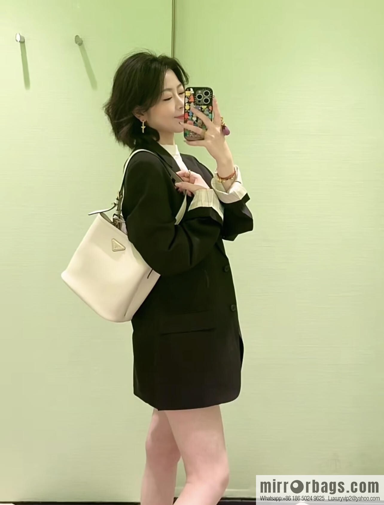 PRADA's new 1BE080 bucket bag, white