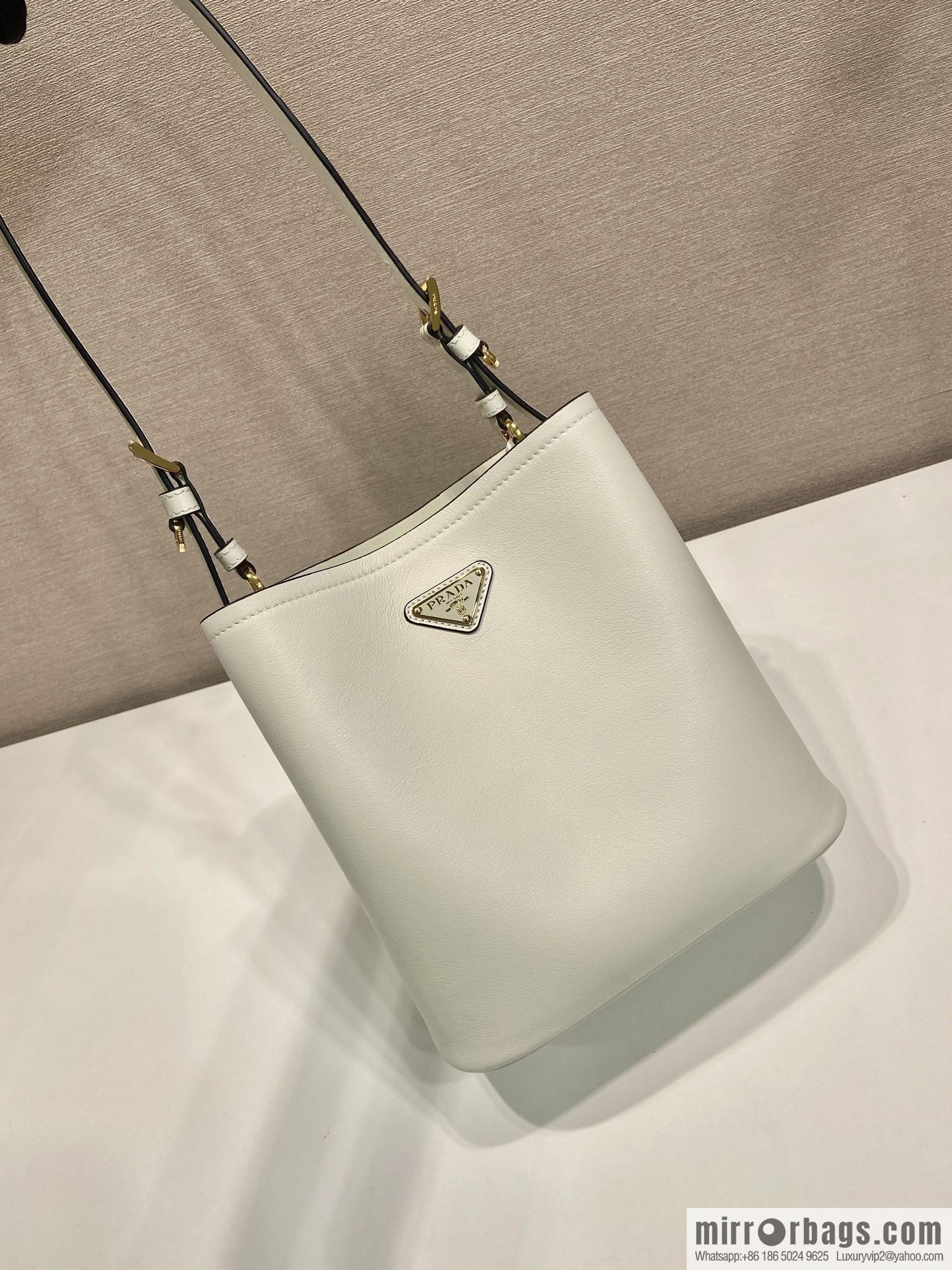 PRADA's new 1BE080 bucket bag, white