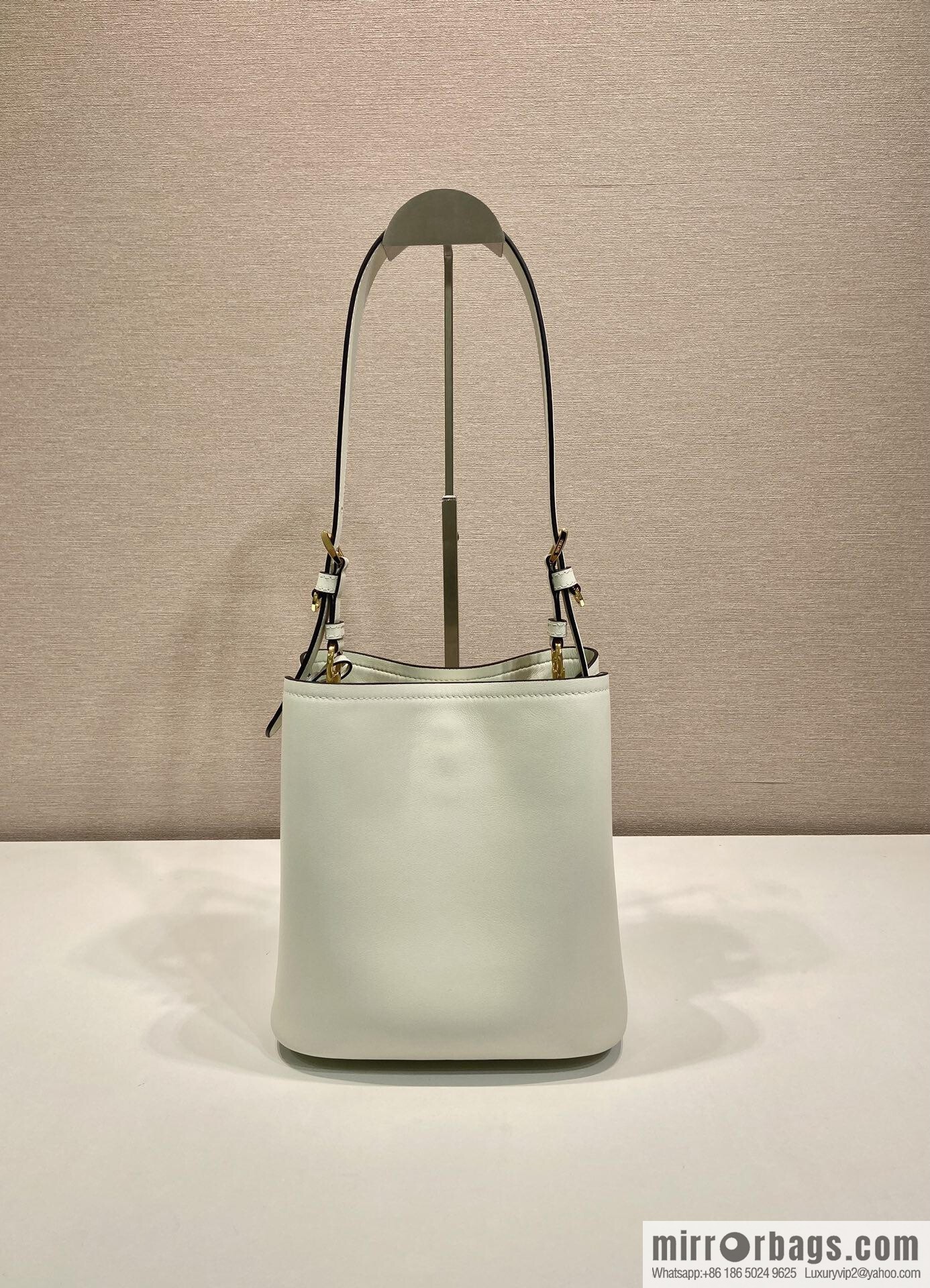 PRADA's new 1BE080 bucket bag, white