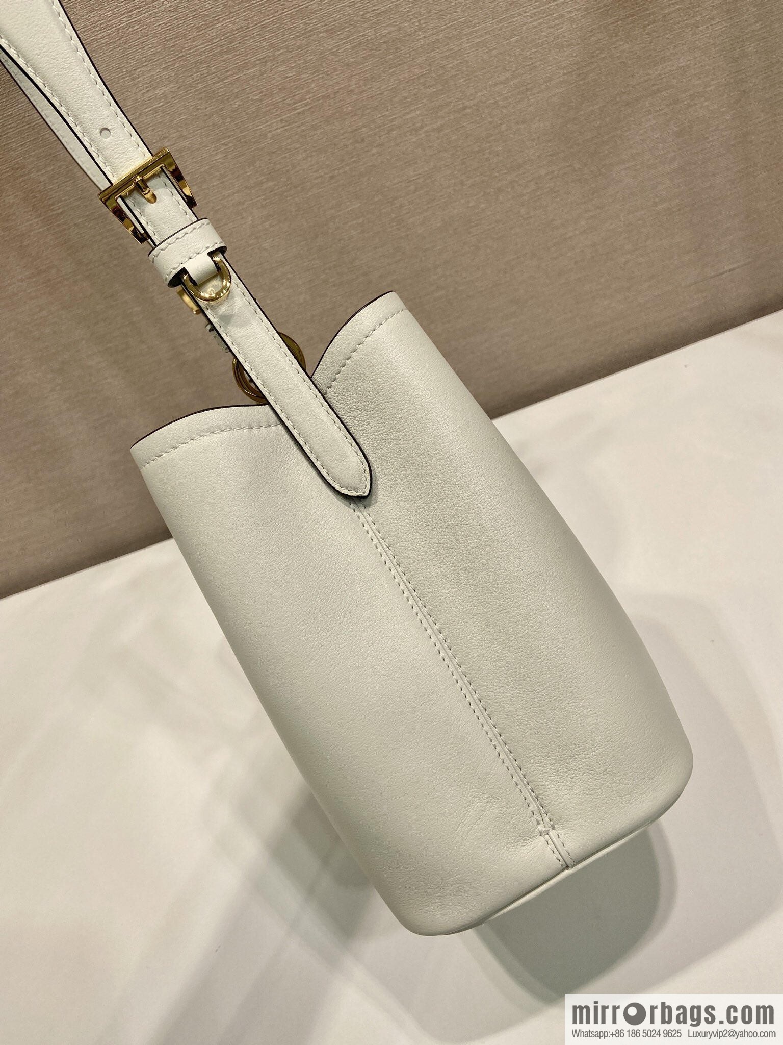 PRADA's new 1BE080 bucket bag, white