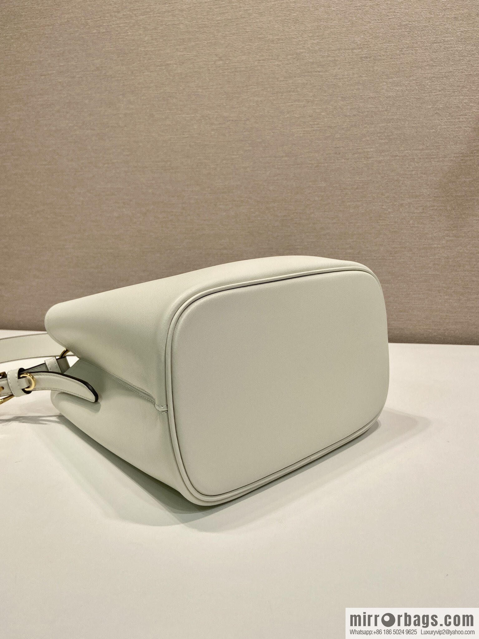 PRADA's new 1BE080 bucket bag, white