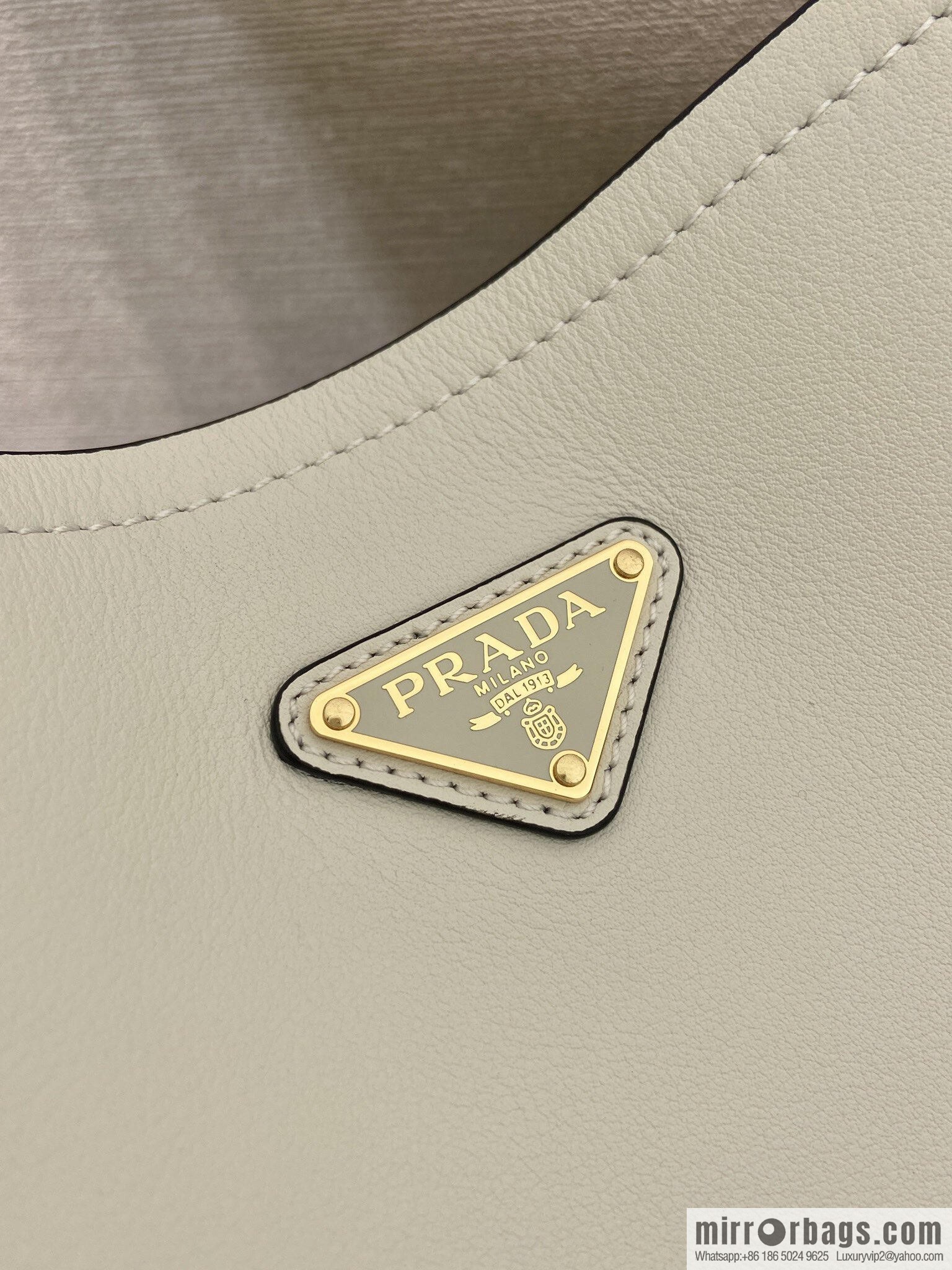 PRADA's new 1BE080 bucket bag, white