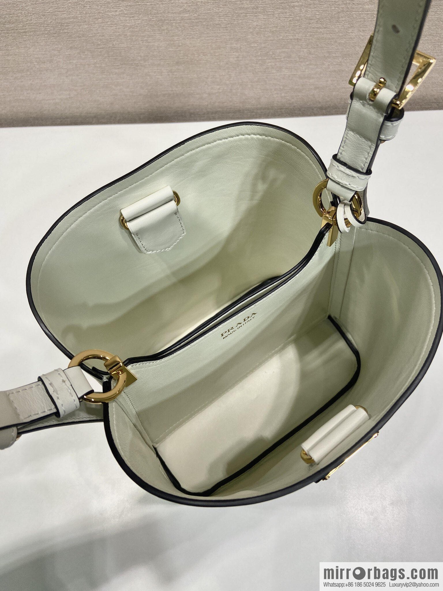PRADA's new 1BE080 bucket bag, white