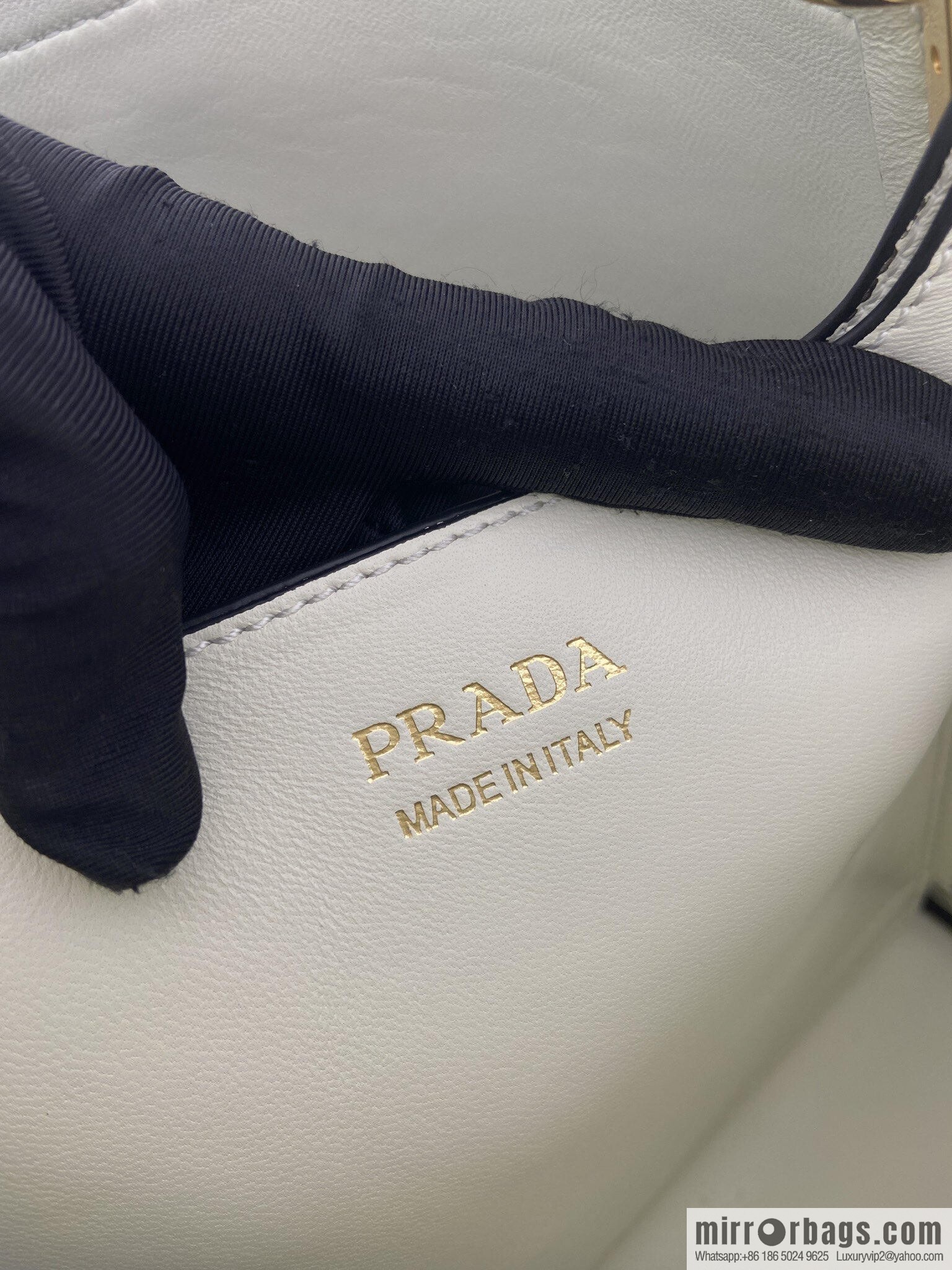 PRADA's new 1BE080 bucket bag, white