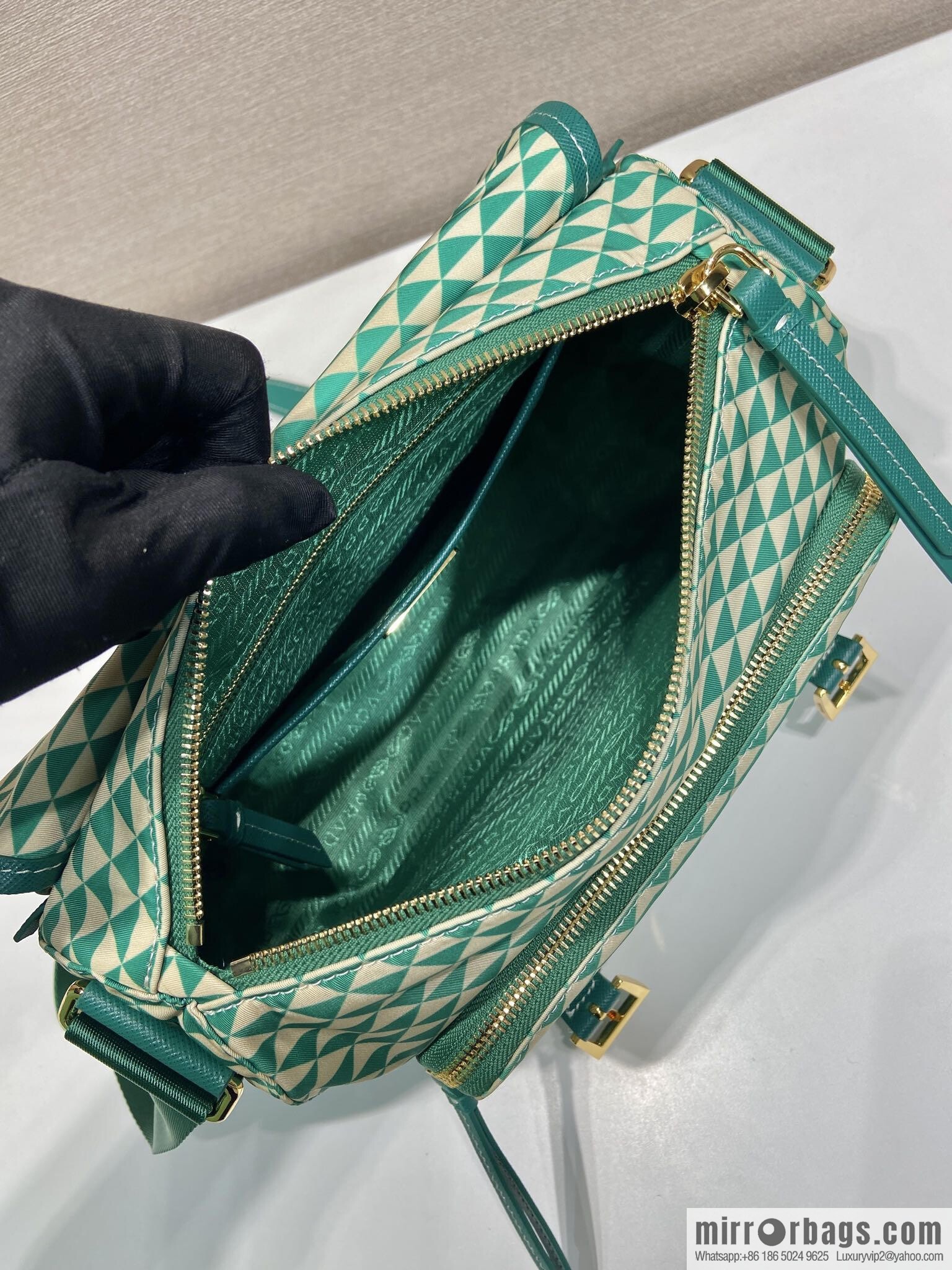 PRADA's new Symbole1BD383 messenger bag, green