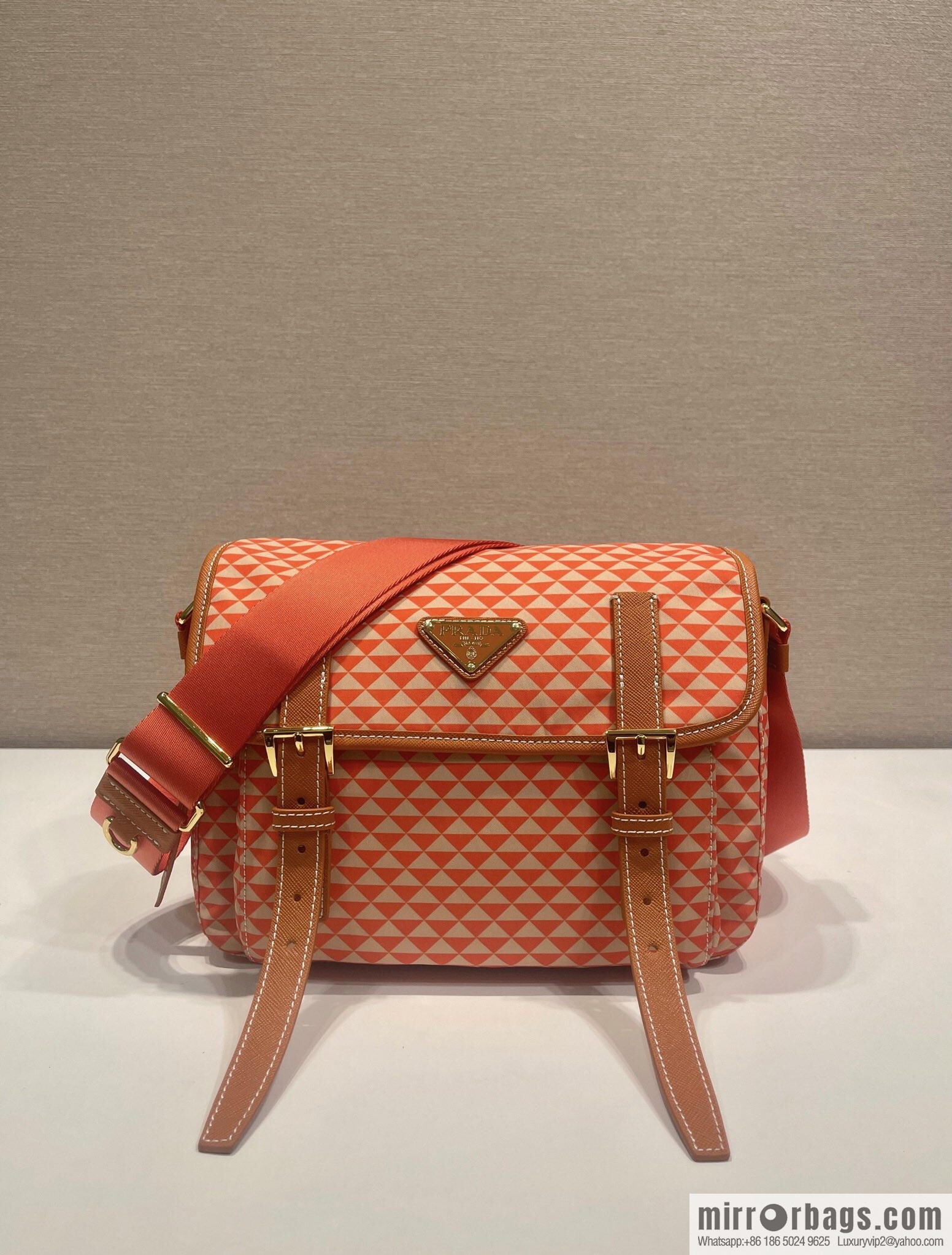 PRADA's new Symbole1BD383 messenger bag, orange