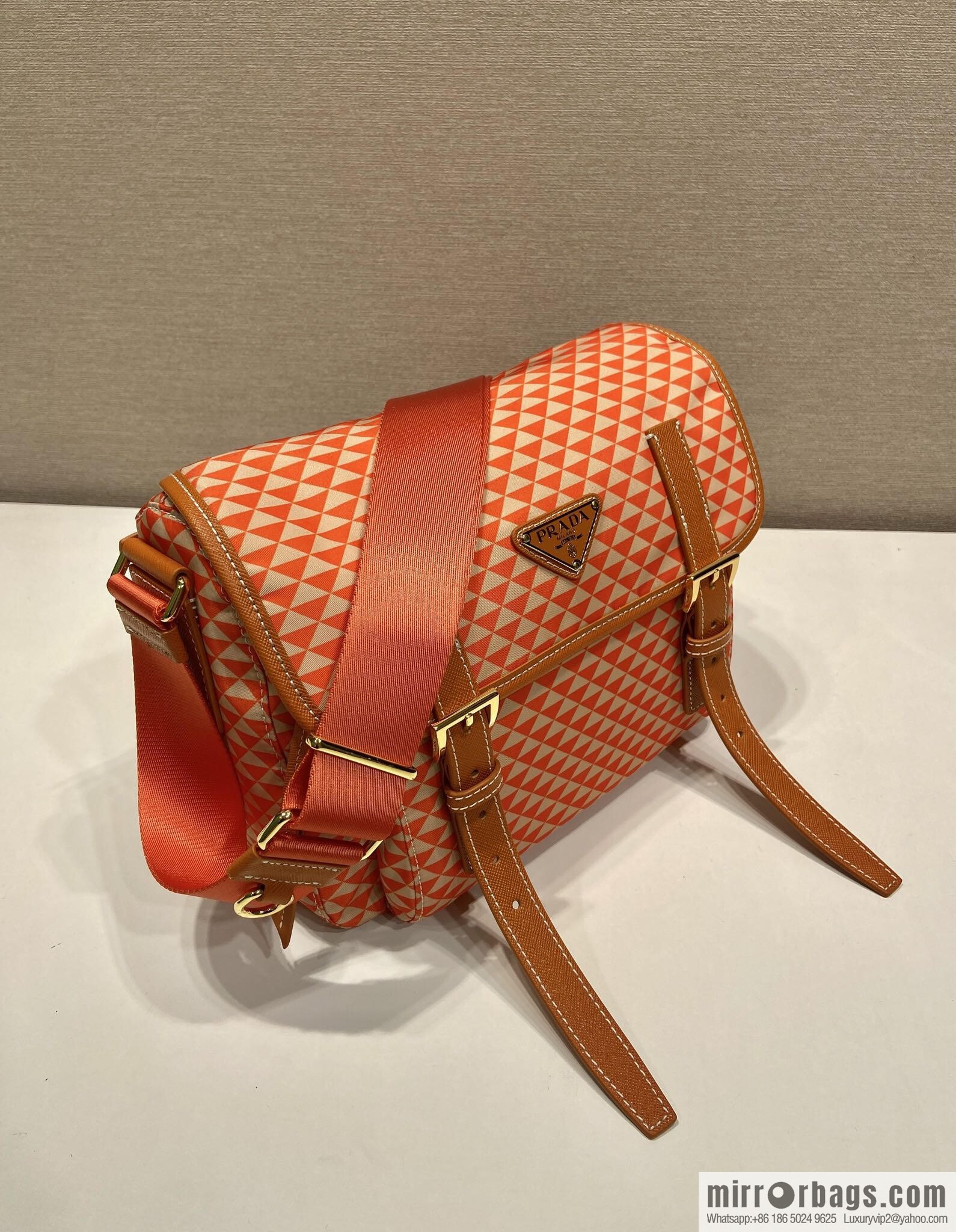 PRADA's new Symbole1BD383 messenger bag, orange