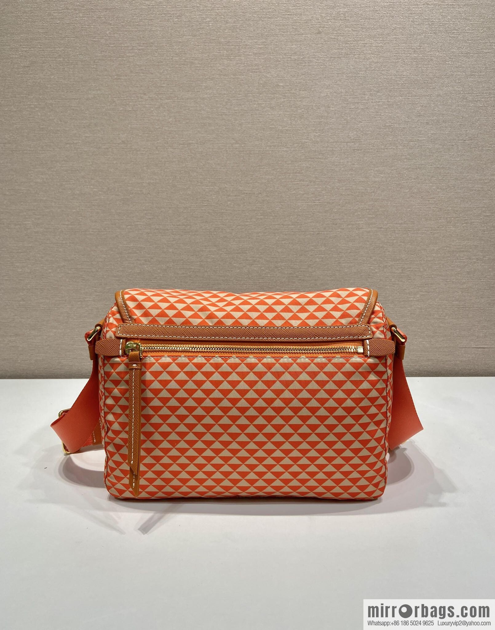 PRADA's new Symbole1BD383 messenger bag, orange