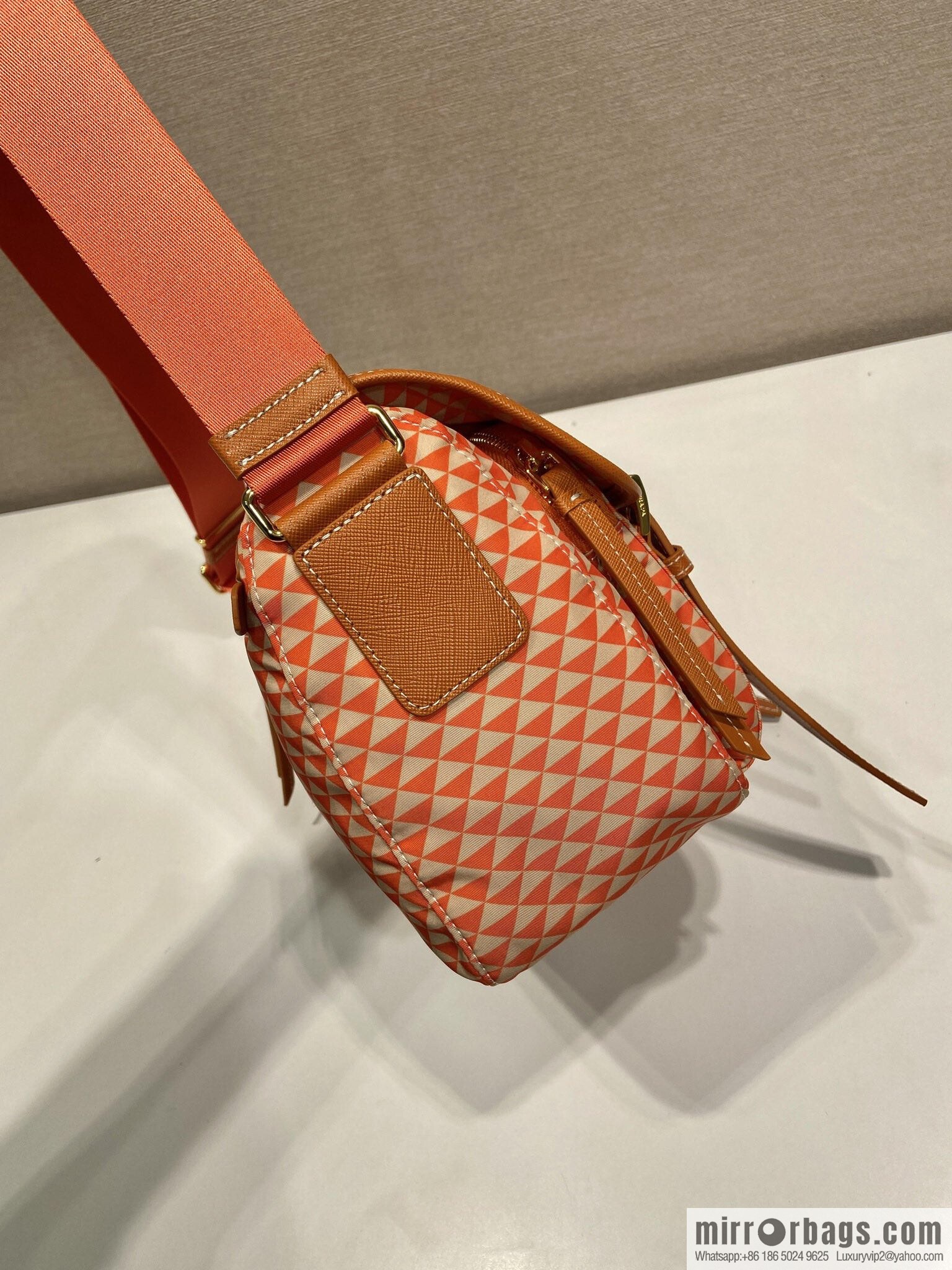 PRADA's new Symbole1BD383 messenger bag, orange