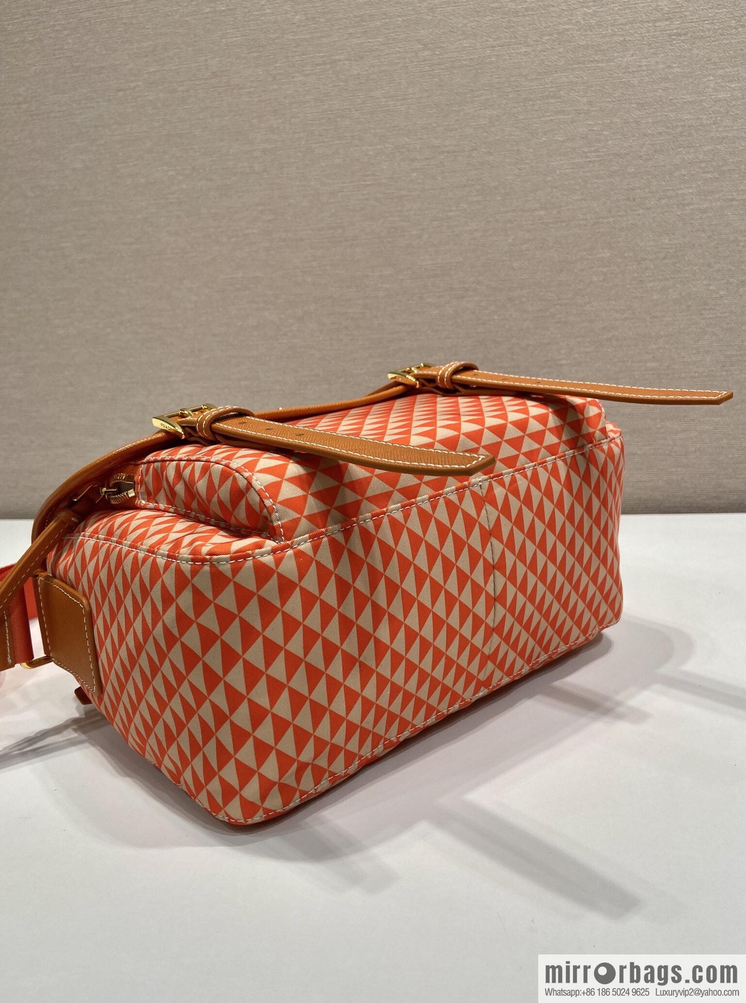 PRADA's new Symbole1BD383 messenger bag, orange