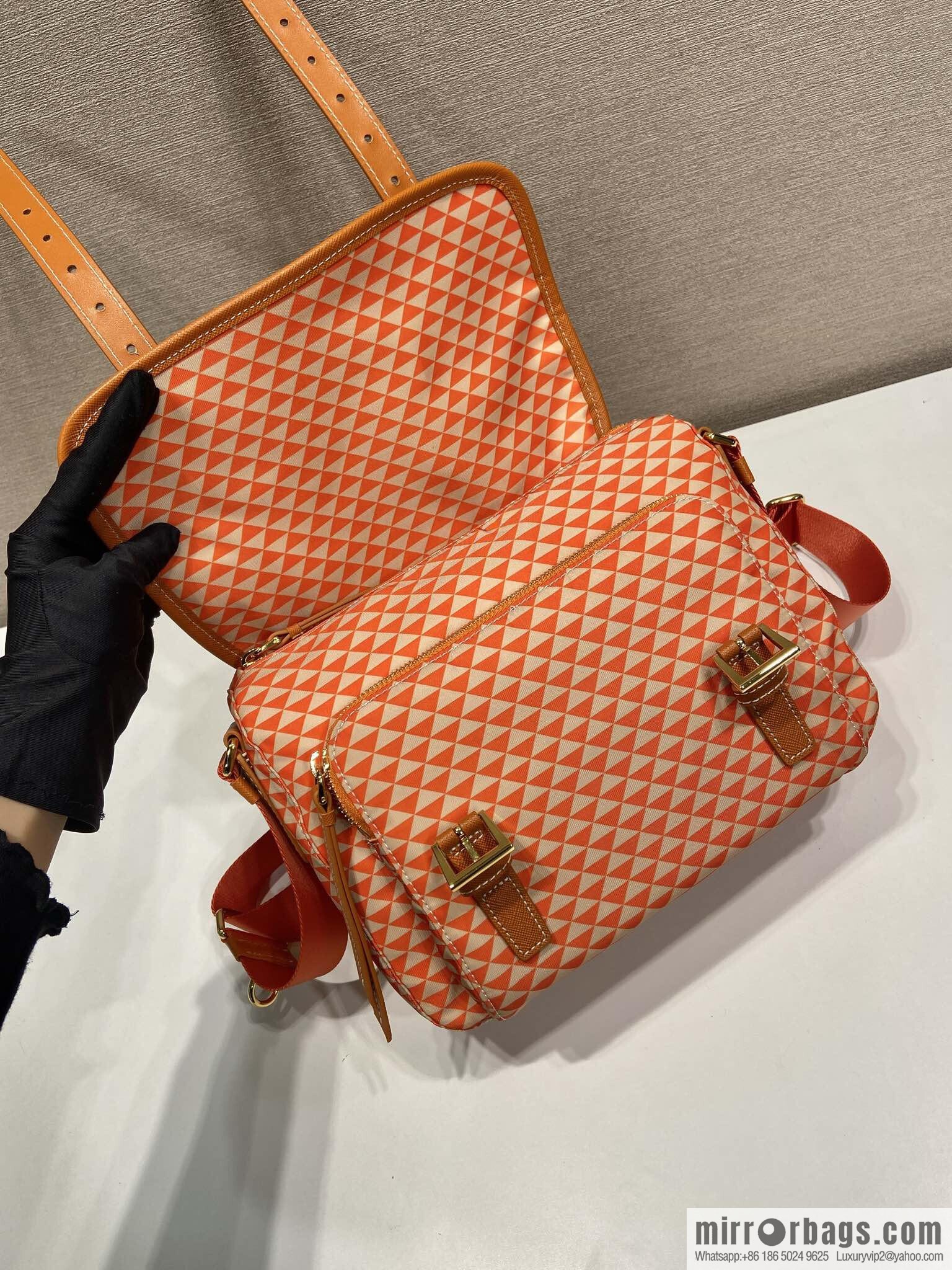 PRADA's new Symbole1BD383 messenger bag, orange