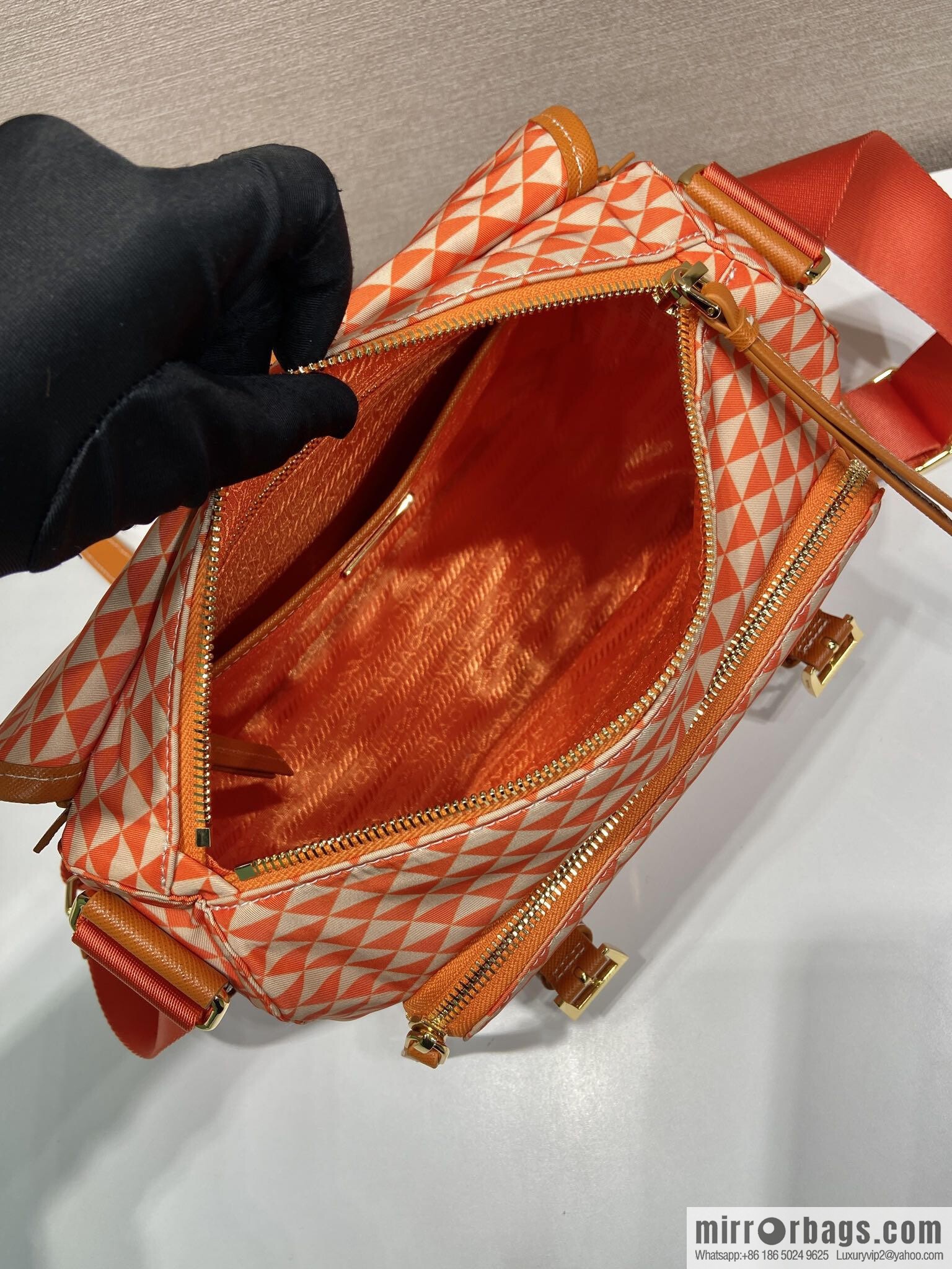 PRADA's new Symbole1BD383 messenger bag, orange