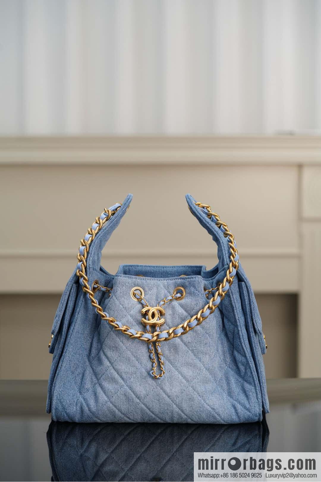 𝐂𝐡𝐚𝐧𝐞𝐥 𝟐𝟓𝐬 𝐬𝐦𝐚𝐥𝐥 𝐡𝐨𝐛𝐨 Drawstring Bucket Bag, Denim Blue 💙 Small AS5293