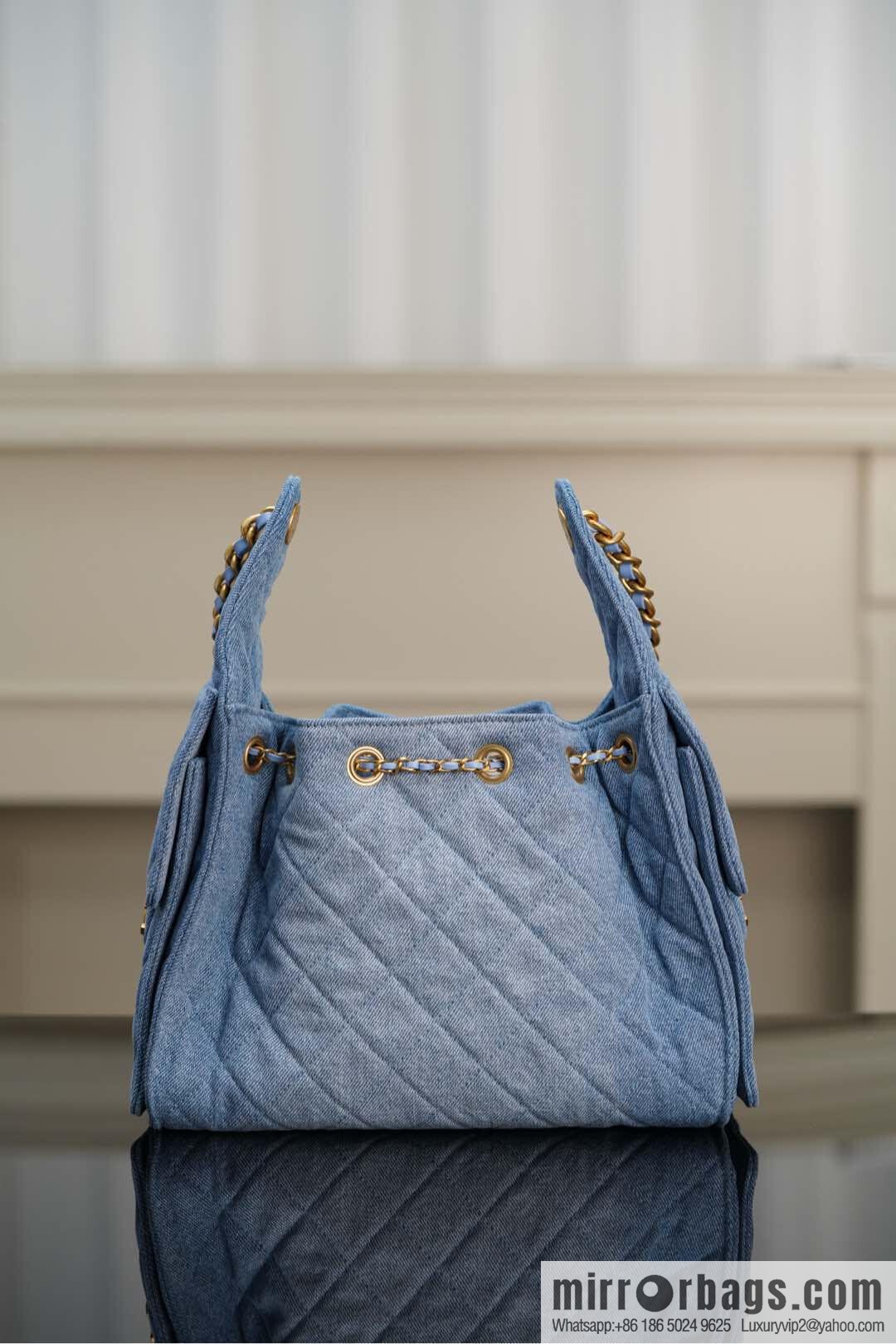 𝐂𝐡𝐚𝐧𝐞𝐥 𝟐𝟓𝐬 𝐬𝐦𝐚𝐥𝐥 𝐡𝐨𝐛𝐨 Drawstring Bucket Bag, Denim Blue 💙 Small AS5293
