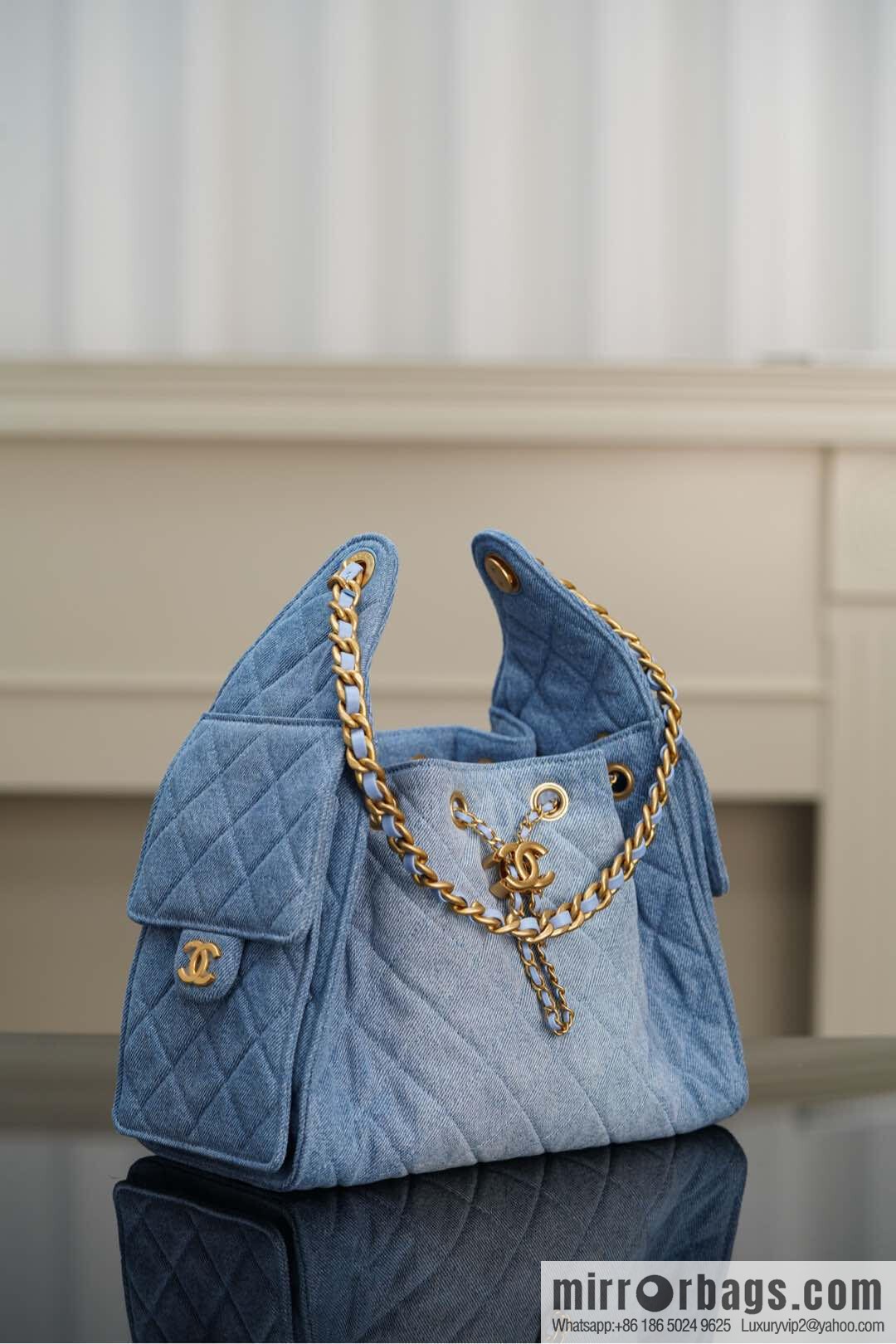 𝐂𝐡𝐚𝐧𝐞𝐥 𝟐𝟓𝐬 𝐬𝐦𝐚𝐥𝐥 𝐡𝐨𝐛𝐨 Drawstring Bucket Bag, Denim Blue 💙 Small AS5293