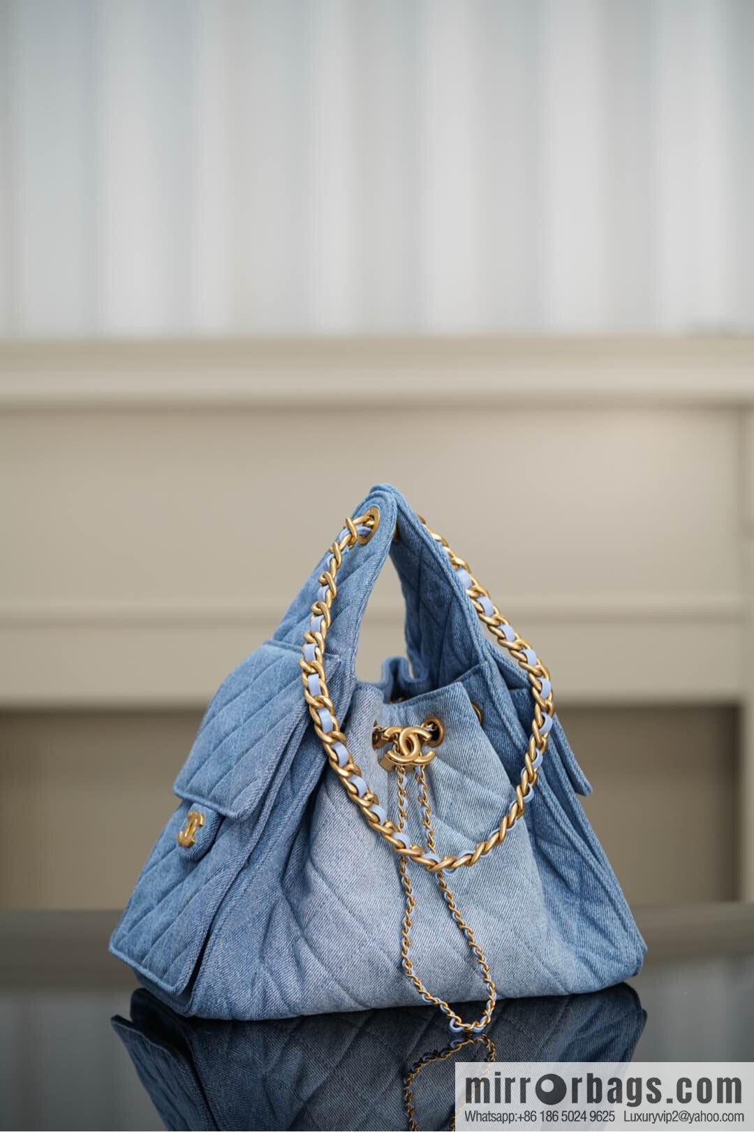 𝐂𝐡𝐚𝐧𝐞𝐥 𝟐𝟓𝐬 𝐬𝐦𝐚𝐥𝐥 𝐡𝐨𝐛𝐨 Drawstring Bucket Bag, Denim Blue 💙 Small AS5293