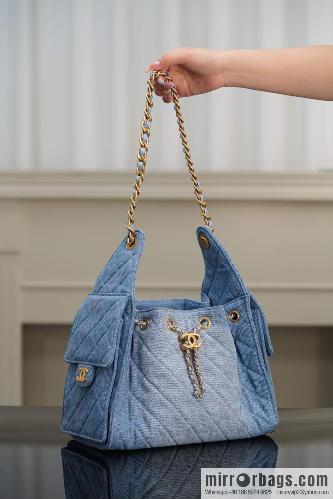 𝐂𝐡𝐚𝐧𝐞𝐥 𝟐𝟓𝐬 𝐬𝐦𝐚𝐥𝐥 𝐡𝐨𝐛𝐨 Drawstring Bucket Bag, Denim Blue 💙 Small AS5293