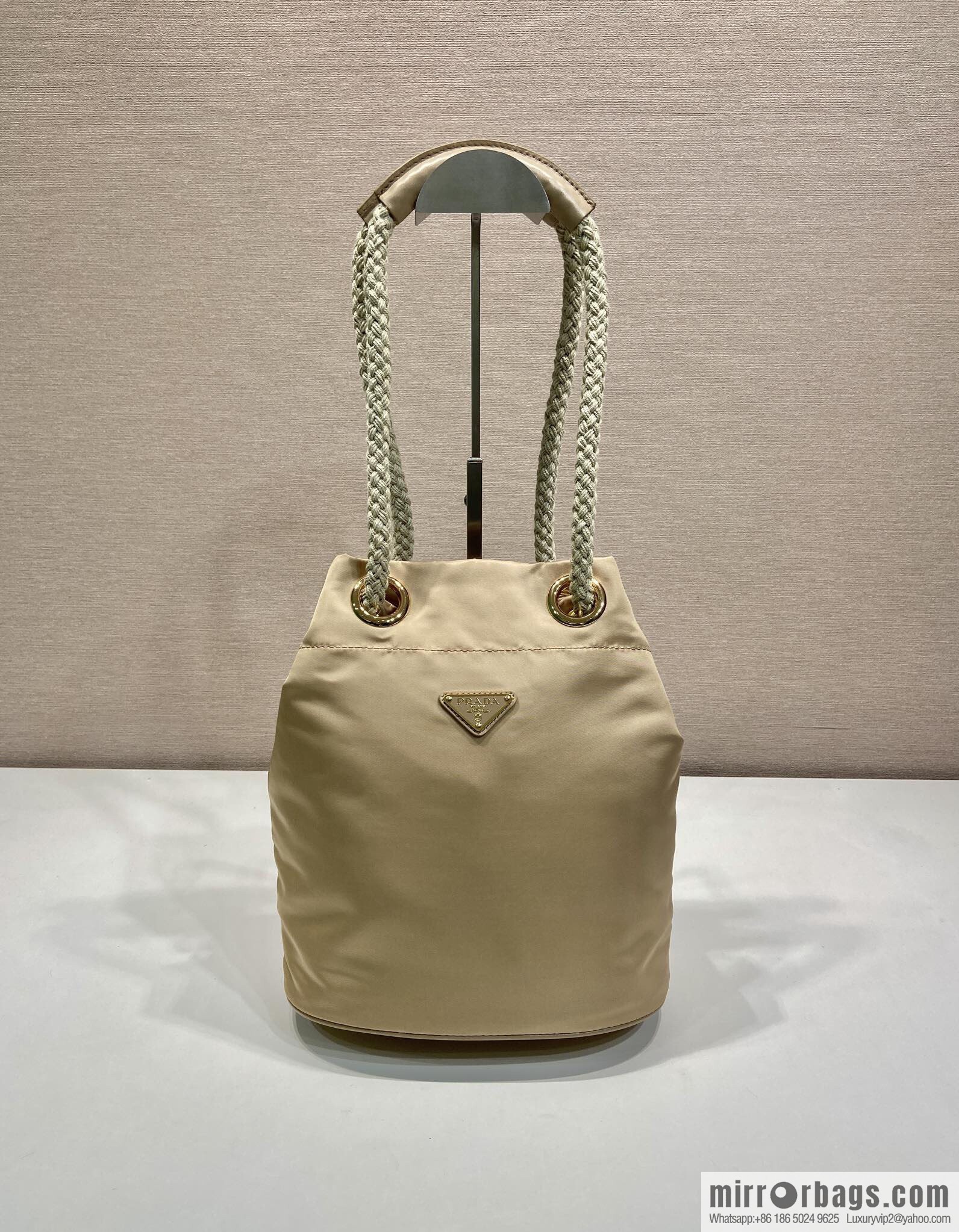 Prada's new bucket bag 1BE082 catwalk model, apricot.