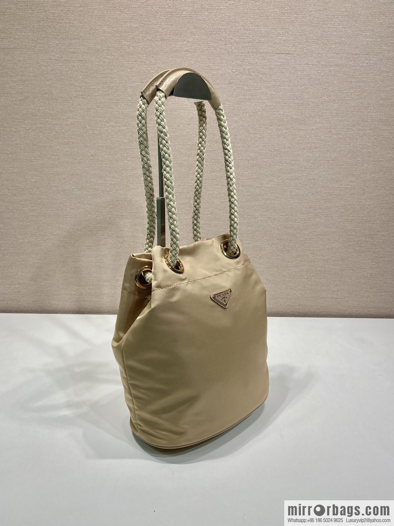 Prada's new bucket bag 1BE082 catwalk model, apricot.